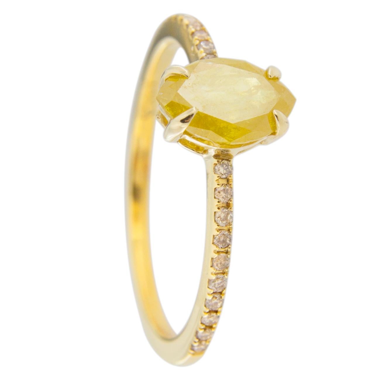 Jona design collection, hand crafted in Italy, 18 karat yellow gold solitaire ring centering an intense fancy yellow marquise cut diamond weighing 0.80 carats. The shoulders are set with 20 round cut brown diamonds, F color,  weighing 0.12 carats in