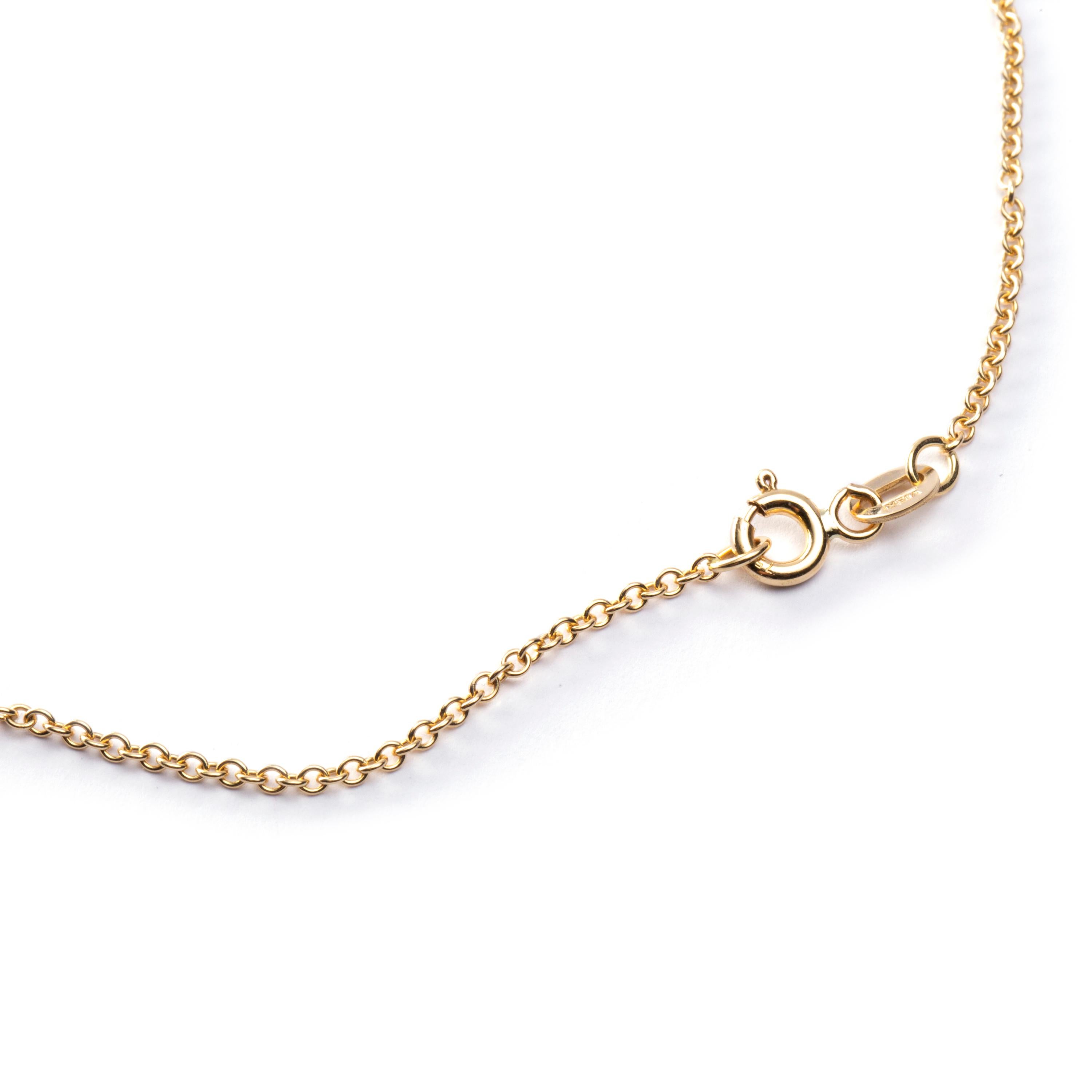Alex Jona design collection, hand crafted in Italy, 18 Karat yellow gold chain necklace featuring 3 drilled round cut rubies weighing 1.56 carats. Dimensions: L x 18.11 in / L x 45cm.

Alex Jona jewels stand out, not only for their special design