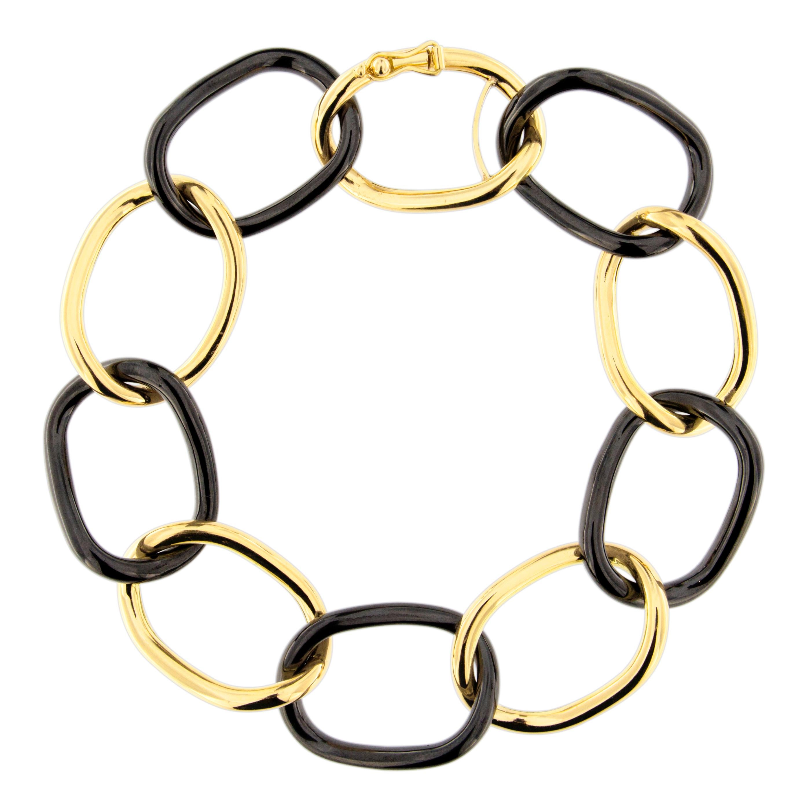 Gebogenes Gliederarmband, High-Tech schwarze Keramik, 18 Karat Gelbgold