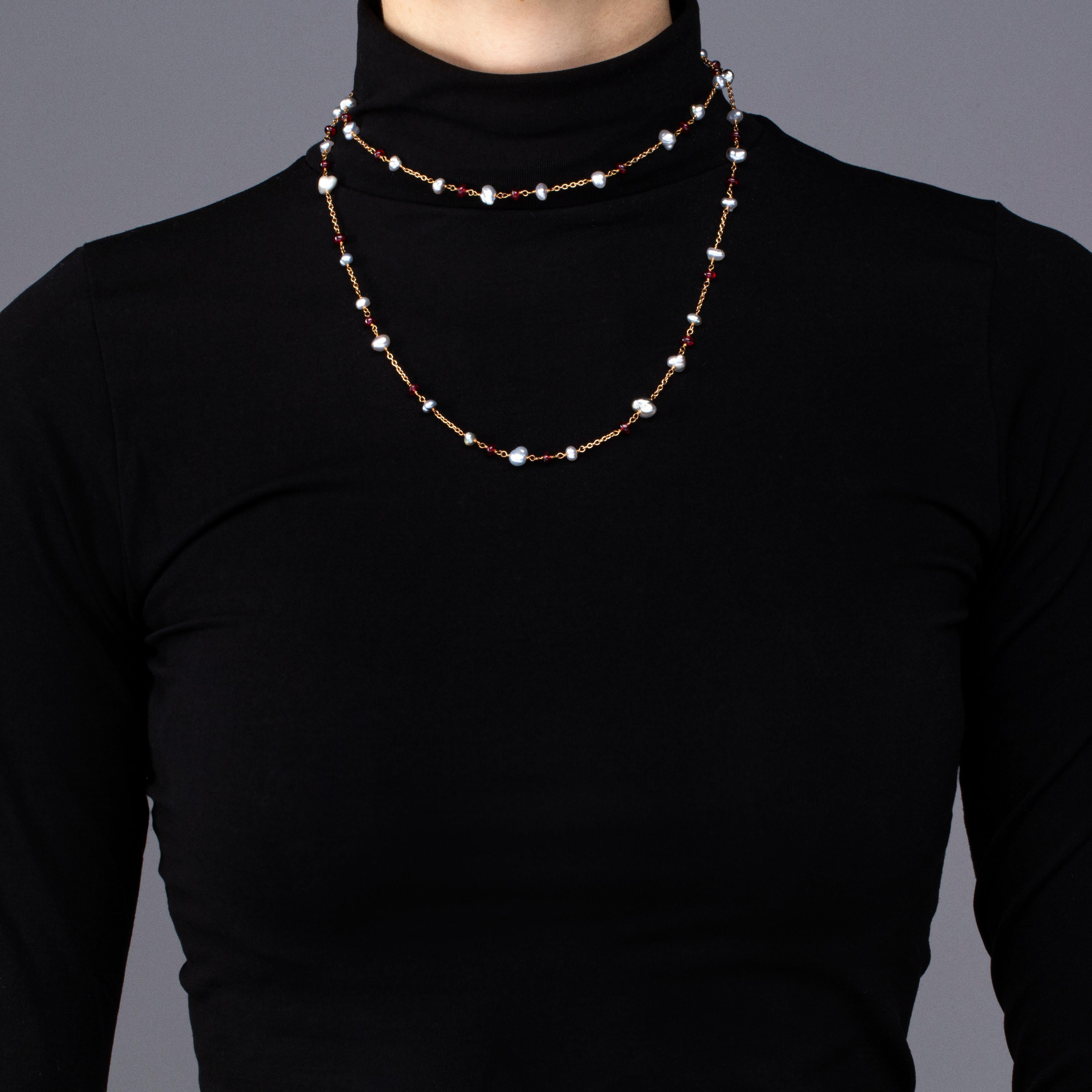 Alex Jona design collection, hand crafted in Italy, 18 karat rose gold keshi pearl and  cabochon spinel (49,40 carats) sautoir long necklace (Total length: 35.5inch/90 cm).

Alex Jona jewels stand out, not only for their special design and for the