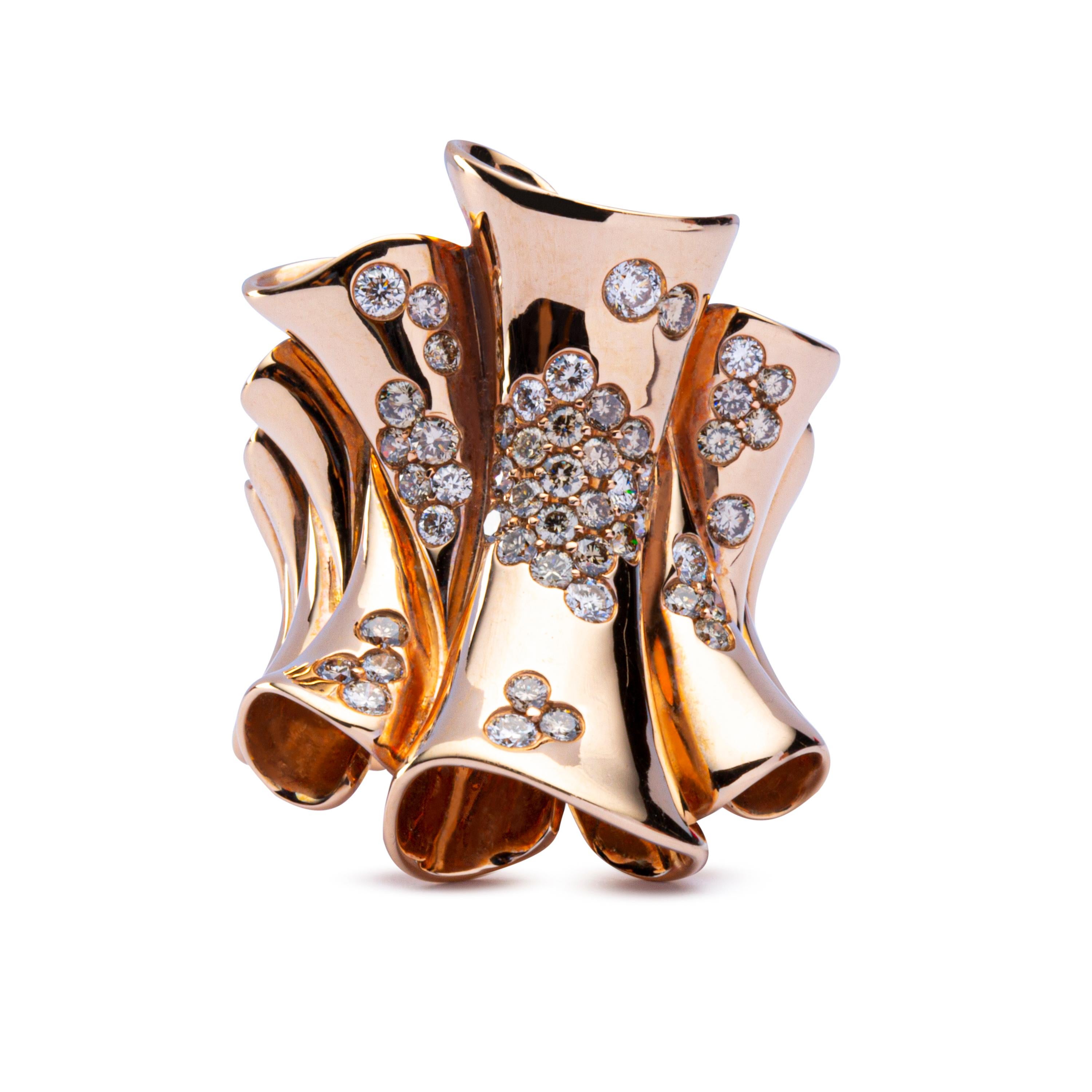 Alex Jona design collection, hand crafted in Italy, Pergamena ring in 18 karat rose gold set with 0.85 carats of champagne diamonds and 0.37 carats of white diamonds. US size 7, can be sized.

Alex Jona jewels stand out, not only for their special