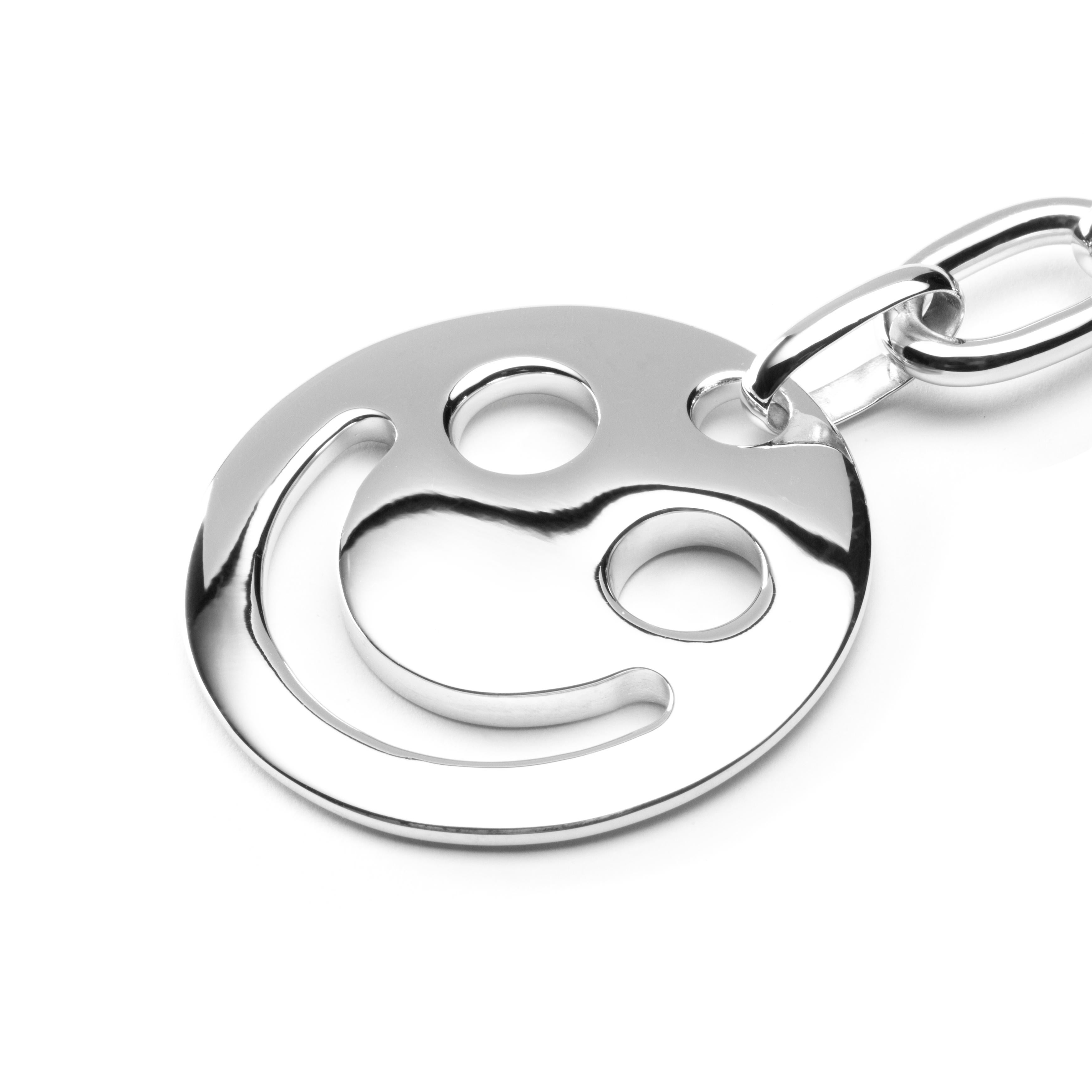 Alex Jona design collection, hand crafted in Italy, rhodium plated Smile Sterling Silver key holder. Dimensions: Diameter: 1.39 in/3.53 mm

Alex Jona gifts stand out, not only for their special design and for the excellent quality, but also for the