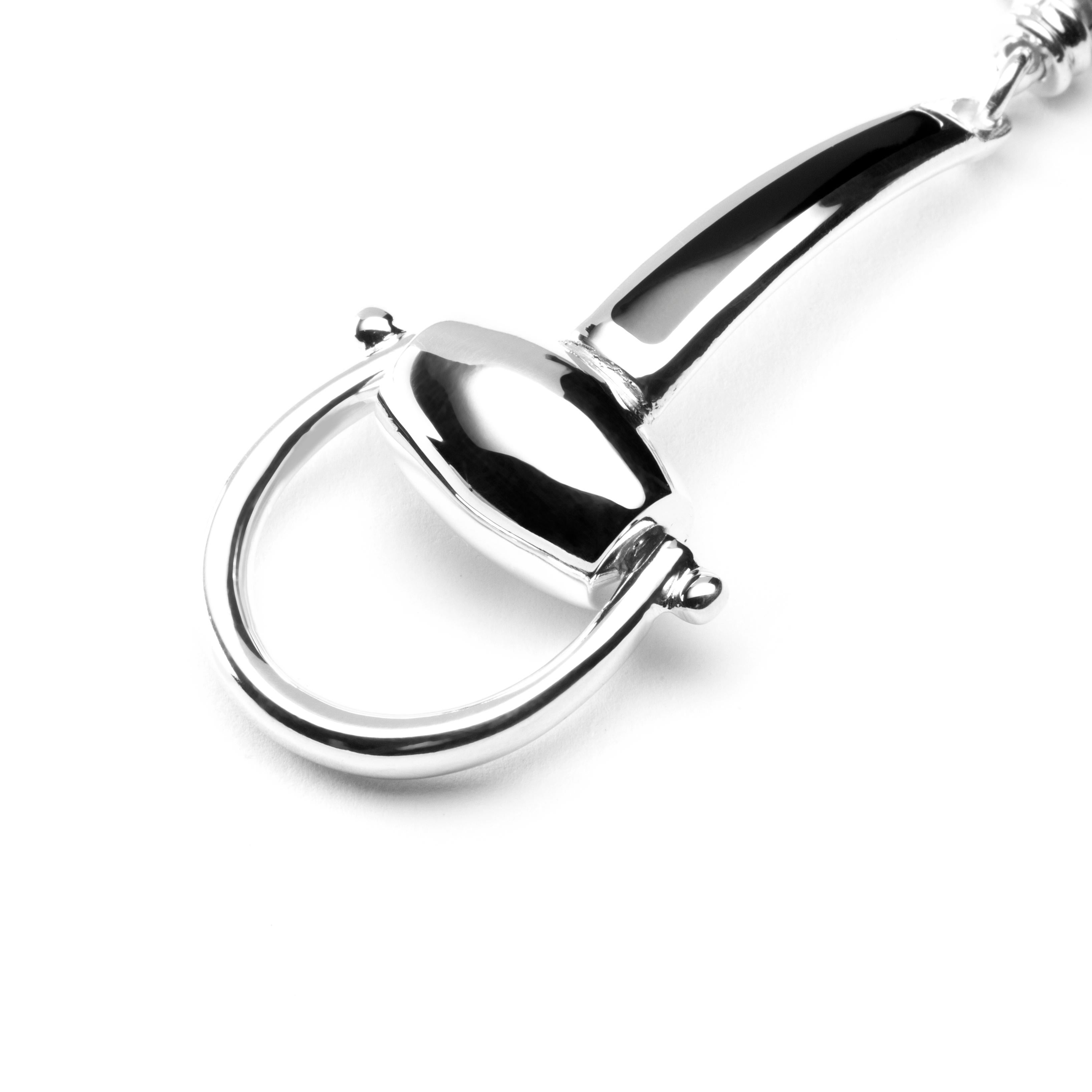 Alex Jona design collection, hand crafted in Italy, rhodium plated equestrian key holder.
Dimensions : L x 3.56 in/ 90.59 mm - W x 0.74 in/ 18.86 mm.

Alex Jona gifts stand out, not only for their special design and for the excellent quality, but