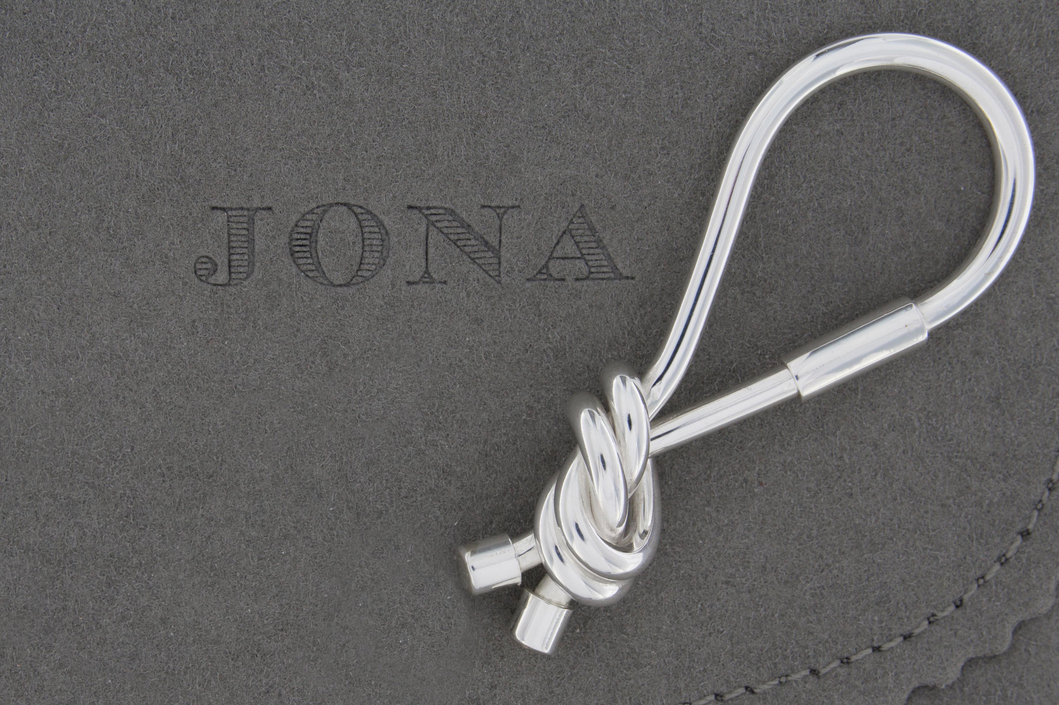 Jona design collection, hand crafted in Italy, Sterling Silver key holder.
Dimensions : L 2.84 in/ 72.36 mm x W 1.18 in/ 30.15 mm x Depth: 0.61 in/ 15.58 mm
All Jona jewelry is new and has never been previously owned or worn. Each item will arrive