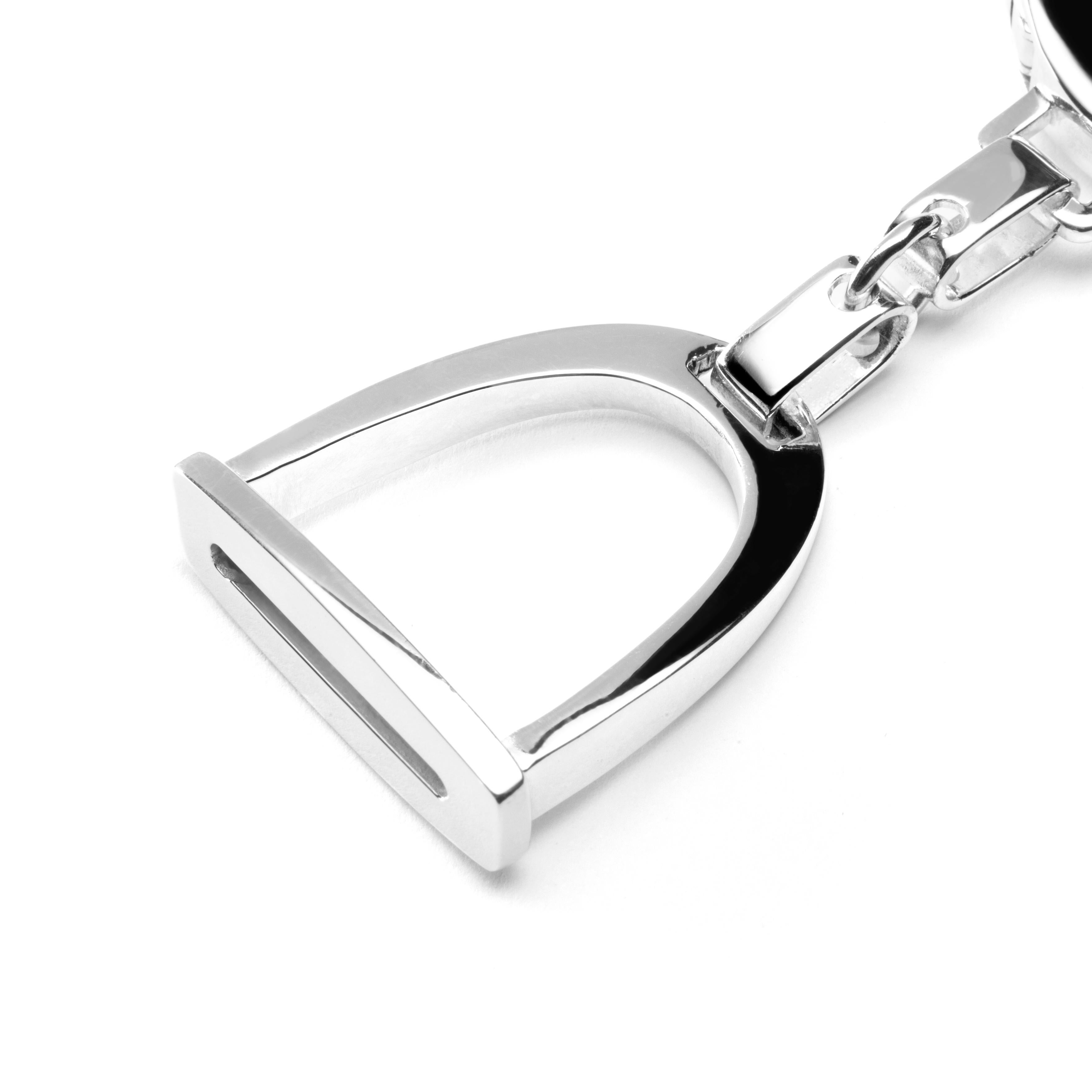 Jona design collection, hand crafted in Italy, rhodium plated sterling stirrup key holder.
Dimensions : L x 3.44 in/ 87.60 mm - W x 1.05 in/ 26.81 mm.
All Jona jewelry is new and has never been previously owned or worn. Each item will arrive at your