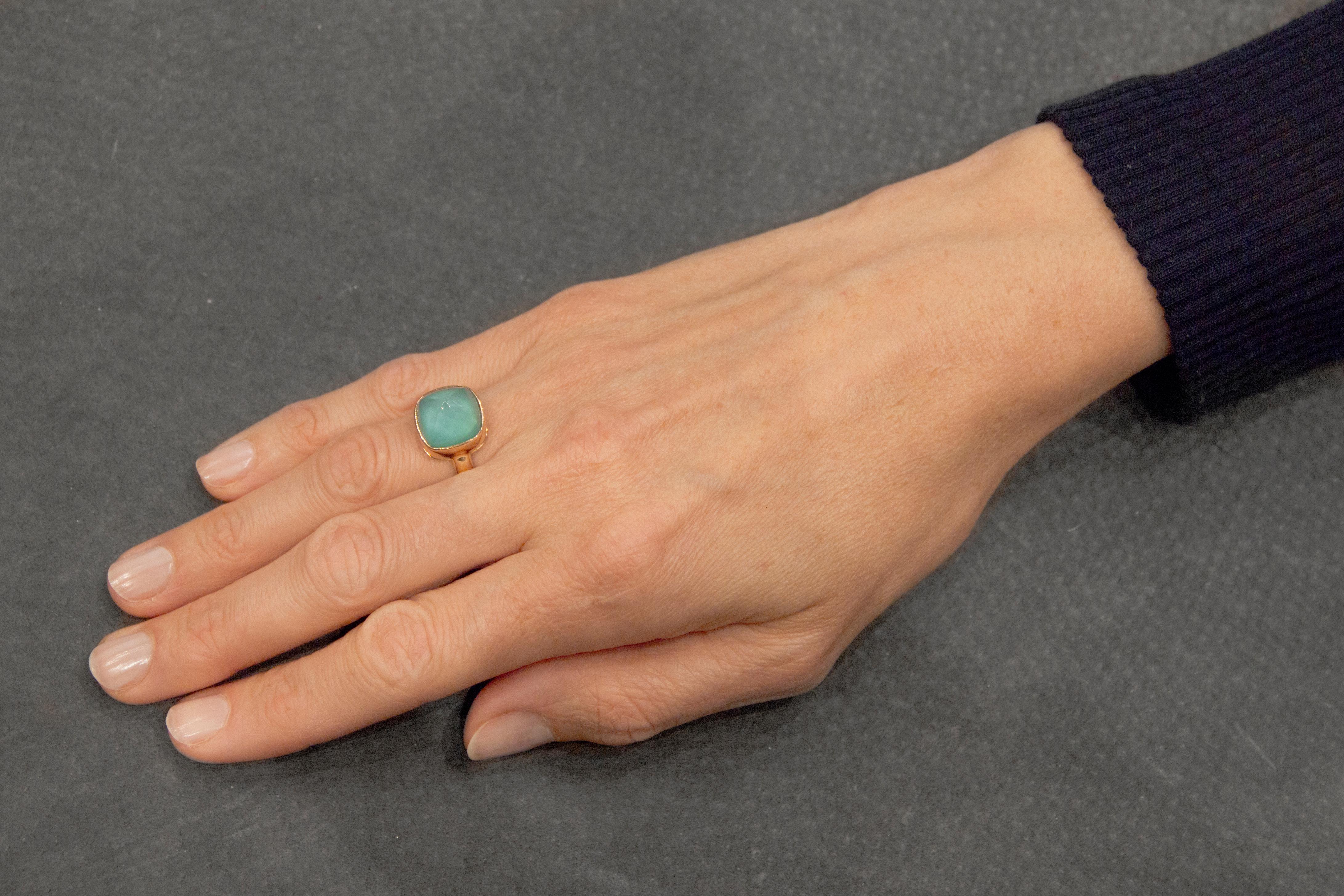 Jona design collection, hand crafted in Italy, 18 Karat yellow gold ring set with a sugar loaf quartz over turquoise, weighing 4 carats. 
Size US 6, can be sized to any specification
All Jona jewelry is new and has never been previously owned or