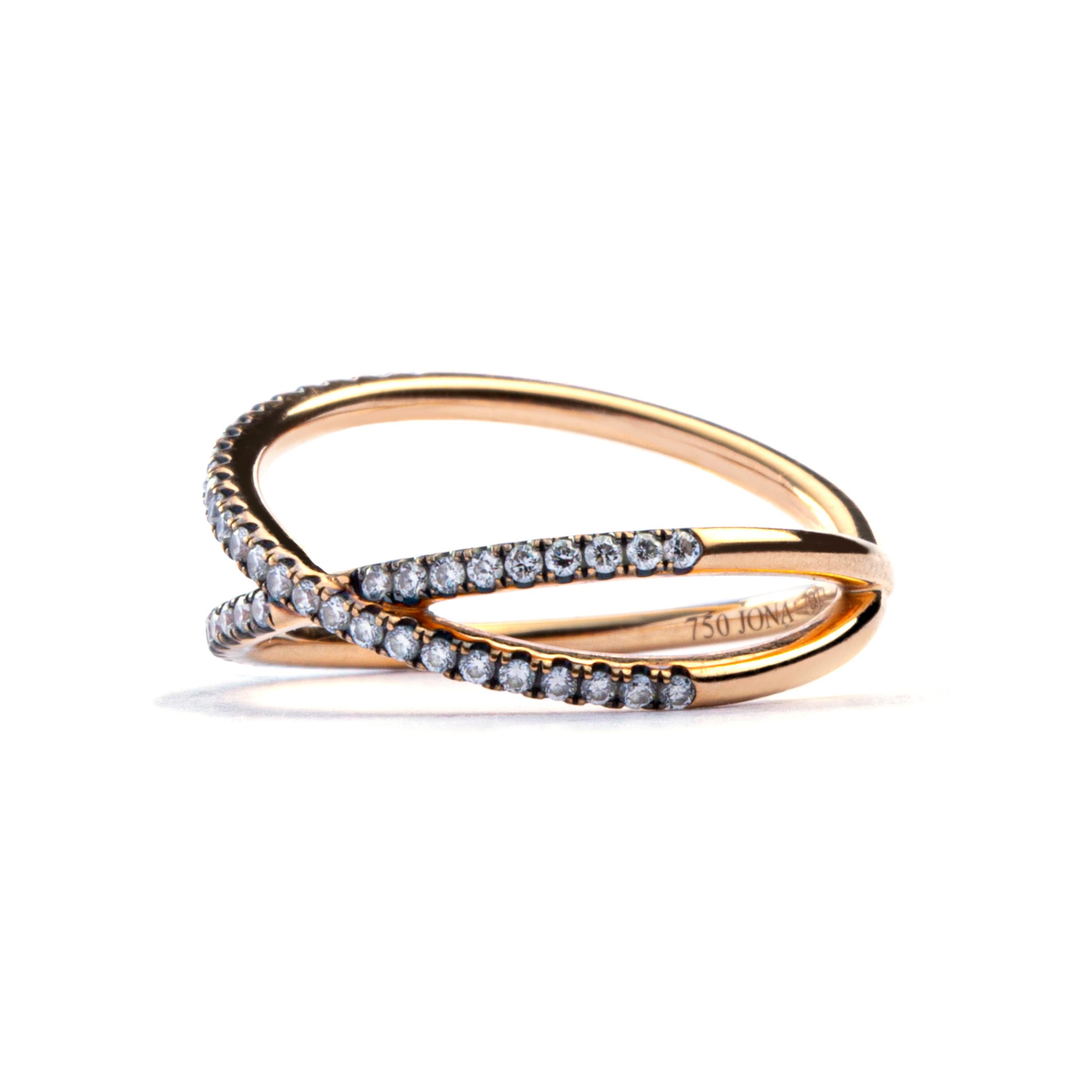 Jona design collection, hand crafted in Italy, 18 karat rose gold Twiggy diamond ring, featuring 0.24 carats of white diamonds with black rhodium setting.
Size US 6 , can be sized to any specification.
All Jona jewelry is new and has never been