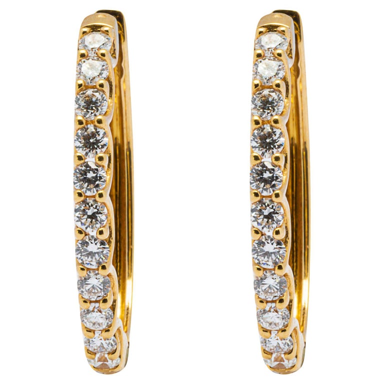 0.67 in x 0.2 in 14K White Gold Diamond-cut Polished Oval Hoop Earring 0.67 in x 0.2 in 14K White Gold Diamond-cut Polished Oval Hoop Earring