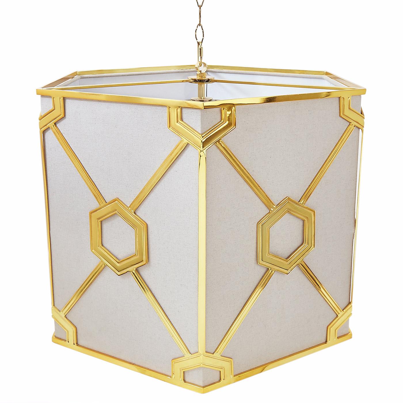 The Turner Chandelier, designed by Jonathan Adler is a beautiful hexagon shaped brass frame with an internal soft dove colored linen shade.  Comes with 2' brass hanging chain, ceiling canopy, hardware and detachable opaque acrylic base to cover