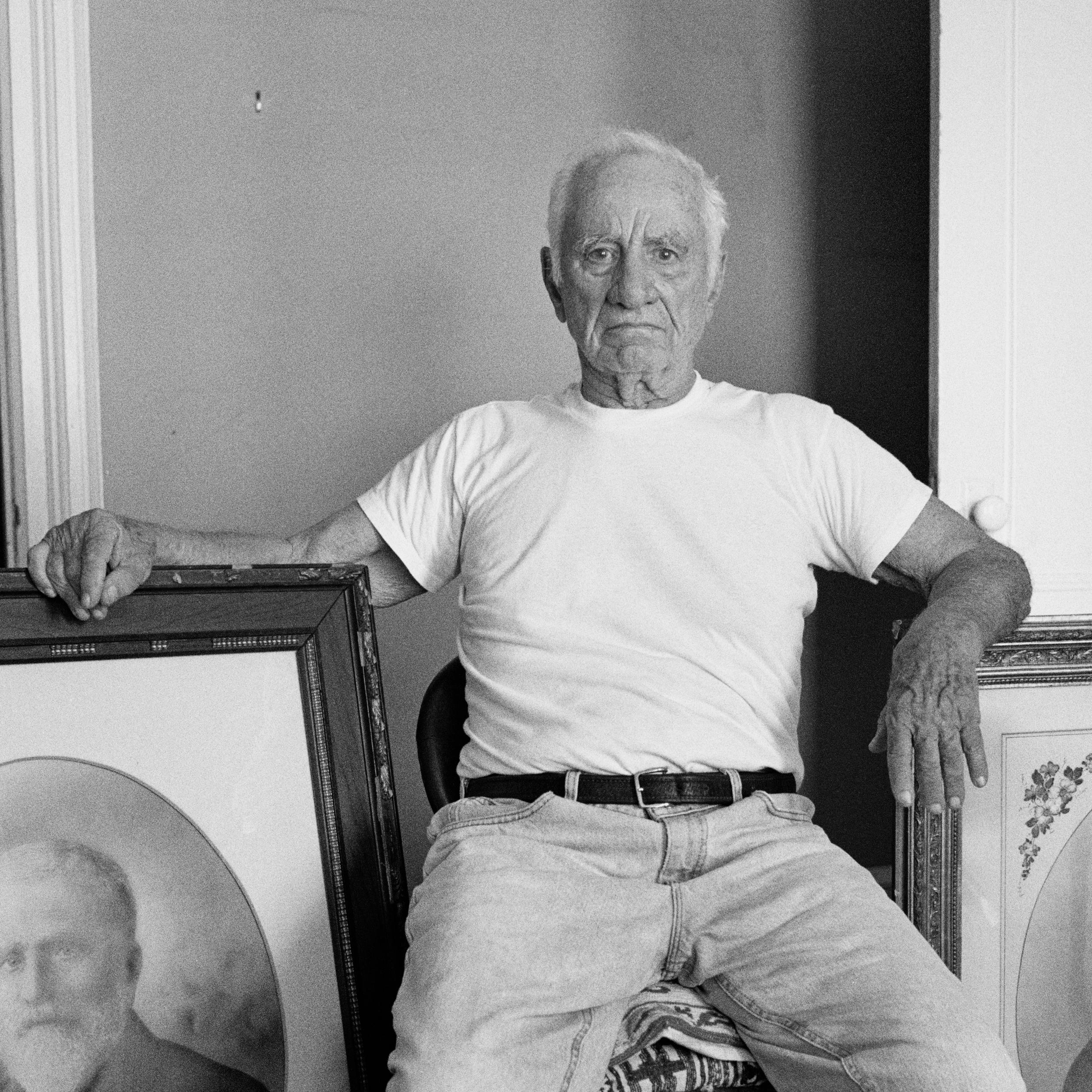 Elia Kazan with portraits of his forebears, at home in New York, 28 June 1999 - Photograph by Jonathan Becker
