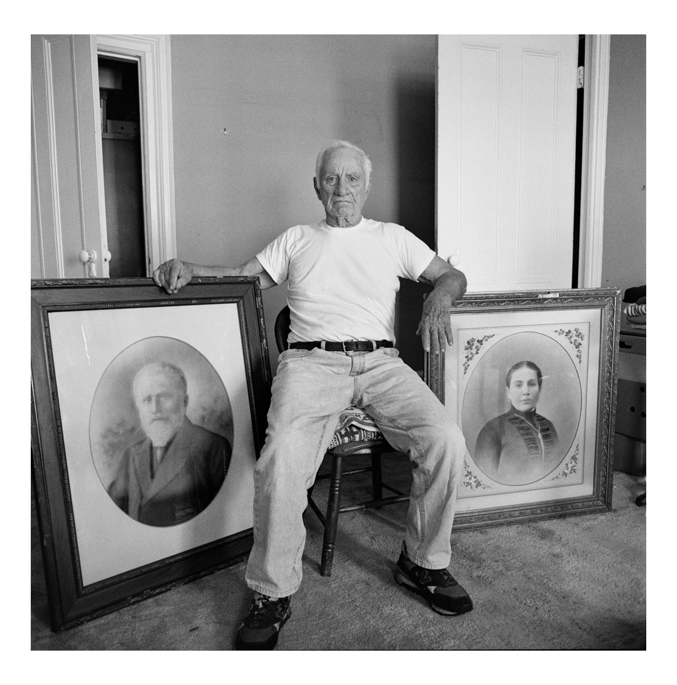 Jonathan Becker Portrait Photograph - Elia Kazan with portraits of his forebears, at home in New York, 28 June 1999