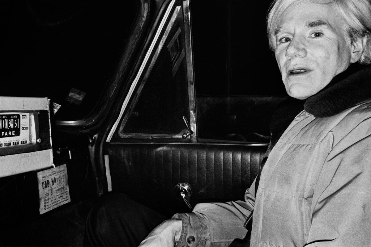 Jonathan Becker Black and White Photograph - Andy Warhol Riding Shotgun in my Checker Cab, New York, 1978