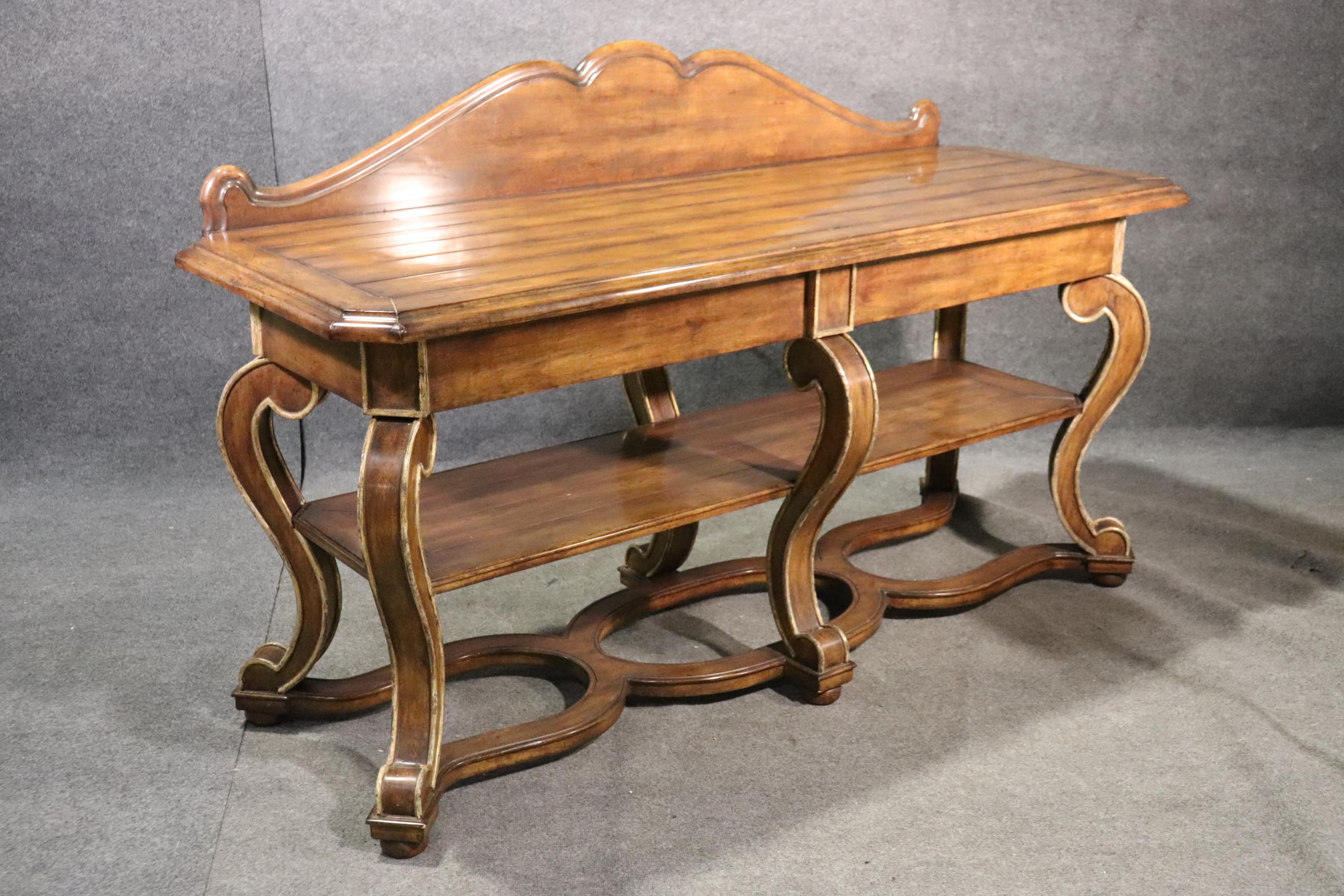 This is a beautiful Jonathan Charles walnut sideboard or console table. The table measures: 79 wide x 47 tall x 28 deep.