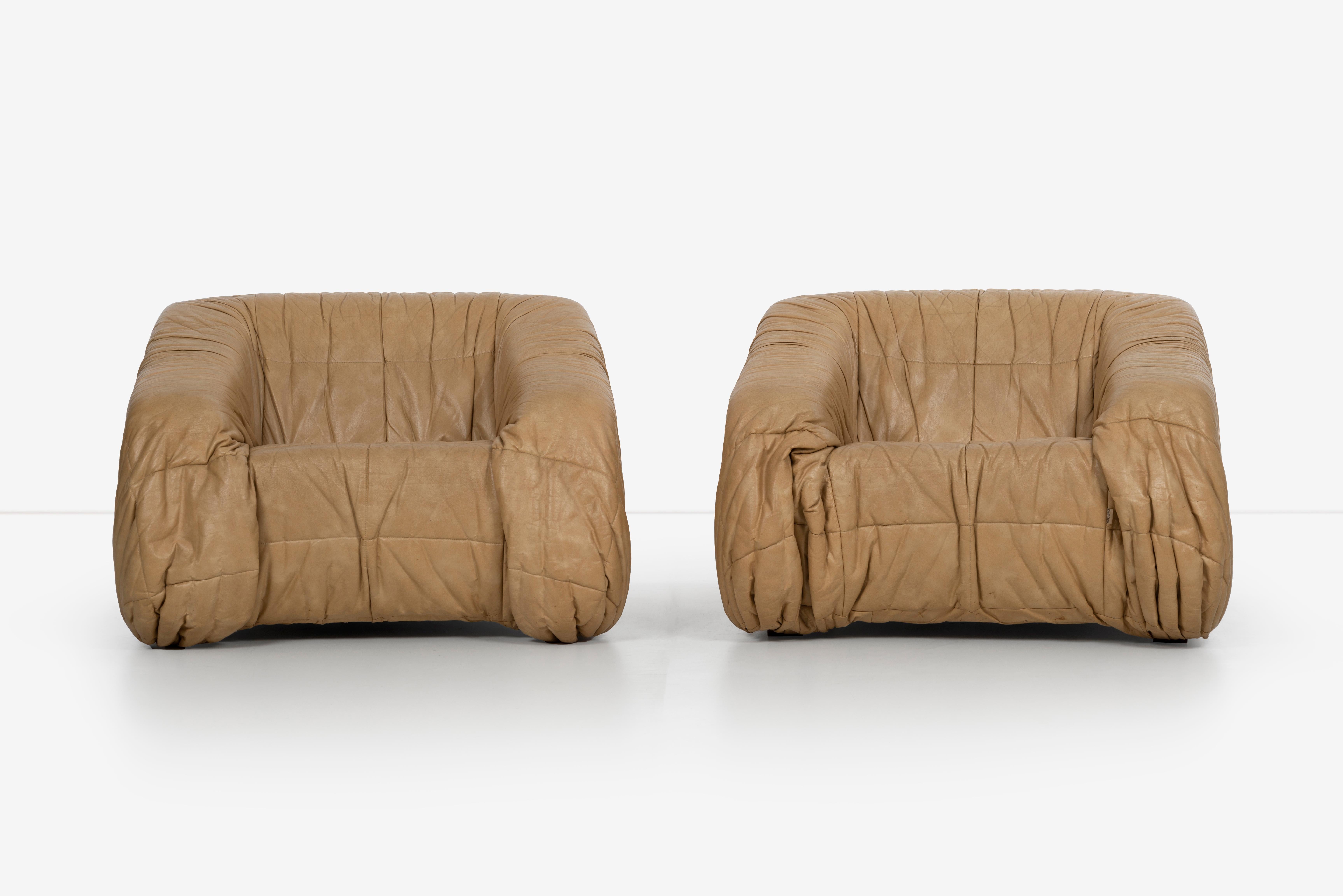 Jonathan de Pas, Donato d'Urbino and Paolo Lomazzi Piumino pair of lounge chairs for Dall'Oca. Quilted vinyl over foam, lacquered beech
Fabric manufacturer's label to seam of each example ‘Dall'Oca’. 



 