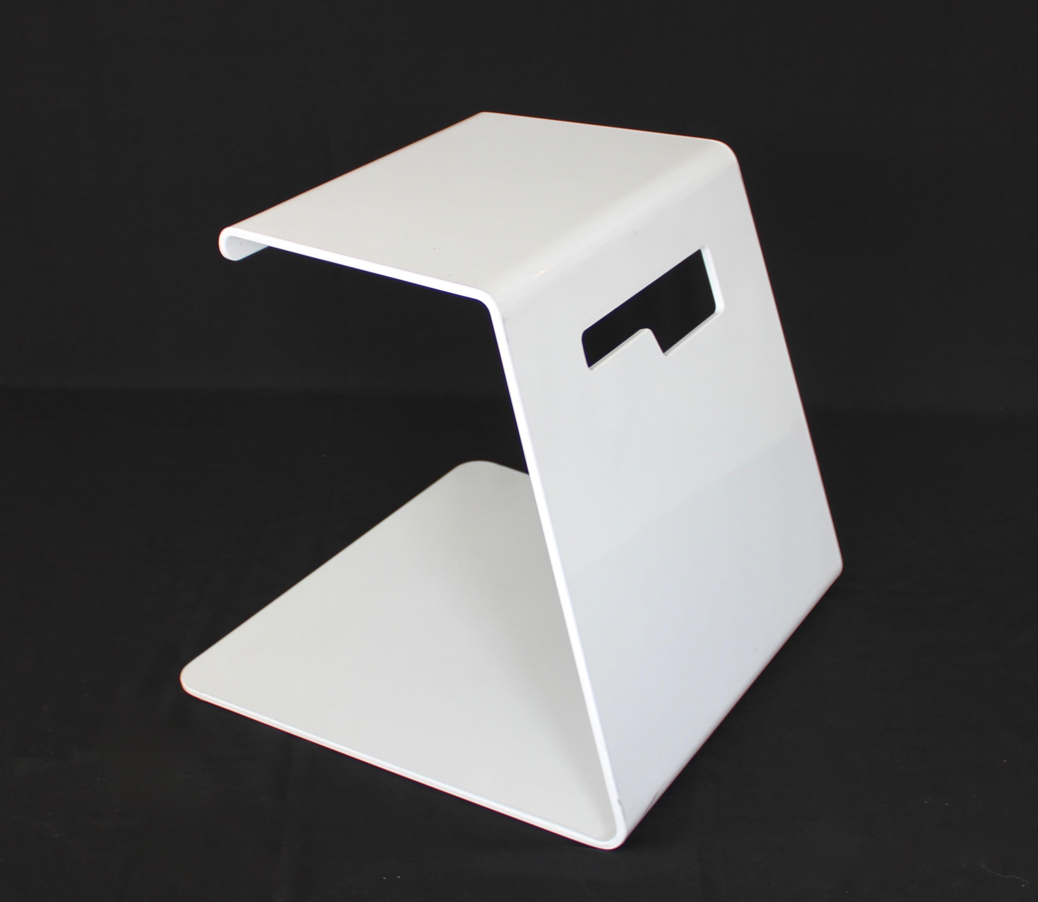 Jonathan Nesci folded aluminum white powder coated Jack Stool. The Jack Stool debuted at ICCF in 2007 and helped to launch the career of contemporary designer Jonathan Nesci. 
He has gone on to produce minimalist furniture in aluminum, both powder