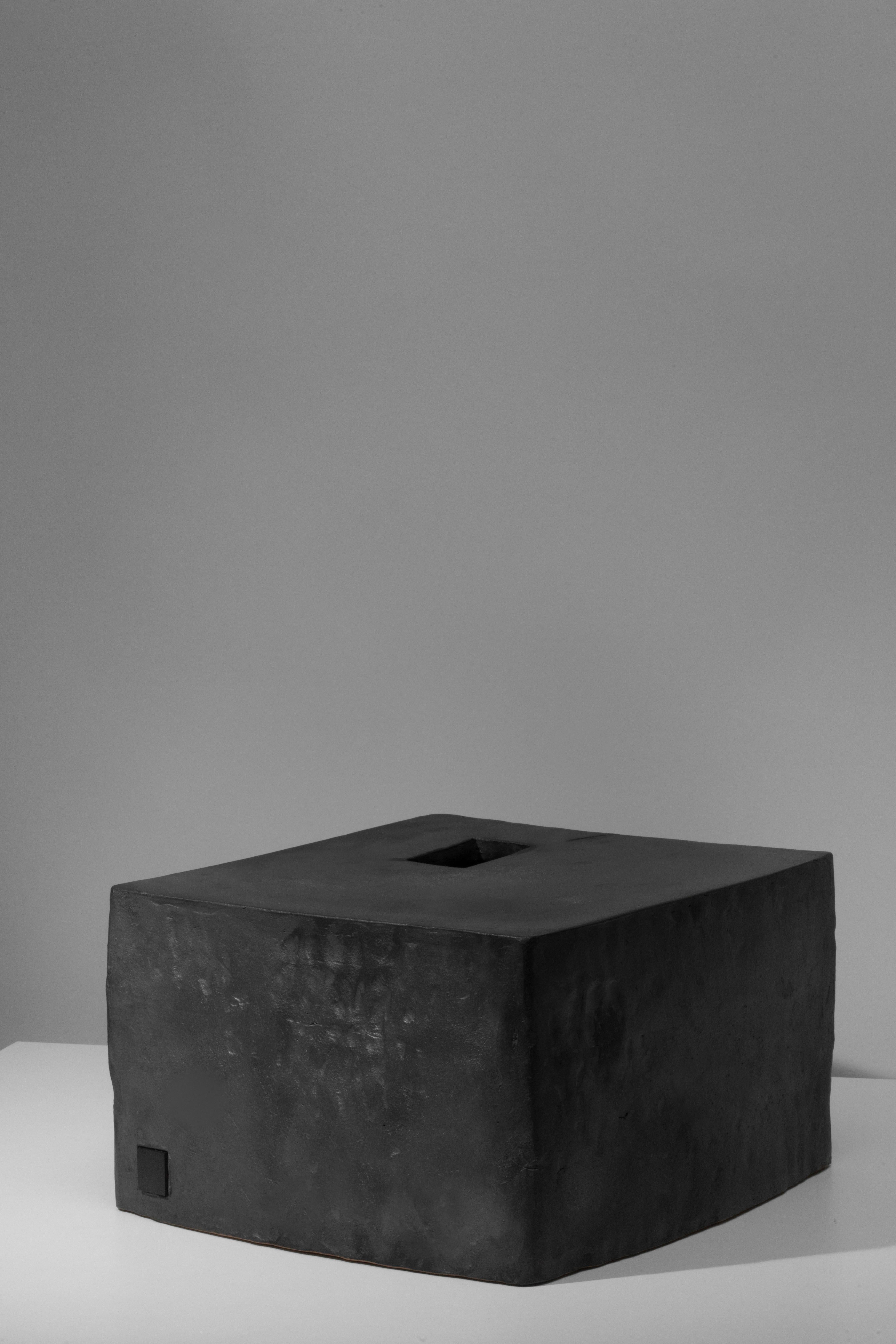 Coil-built ceramic low table with black coppered glaze. Marked with an engraved bronze label to underside: Jonathan Nesci w/ Robert Pulley 18/12. 

Designed by Jonathan Nesci and made in Columbus, Indiana by local ceramist Robert Pulley for