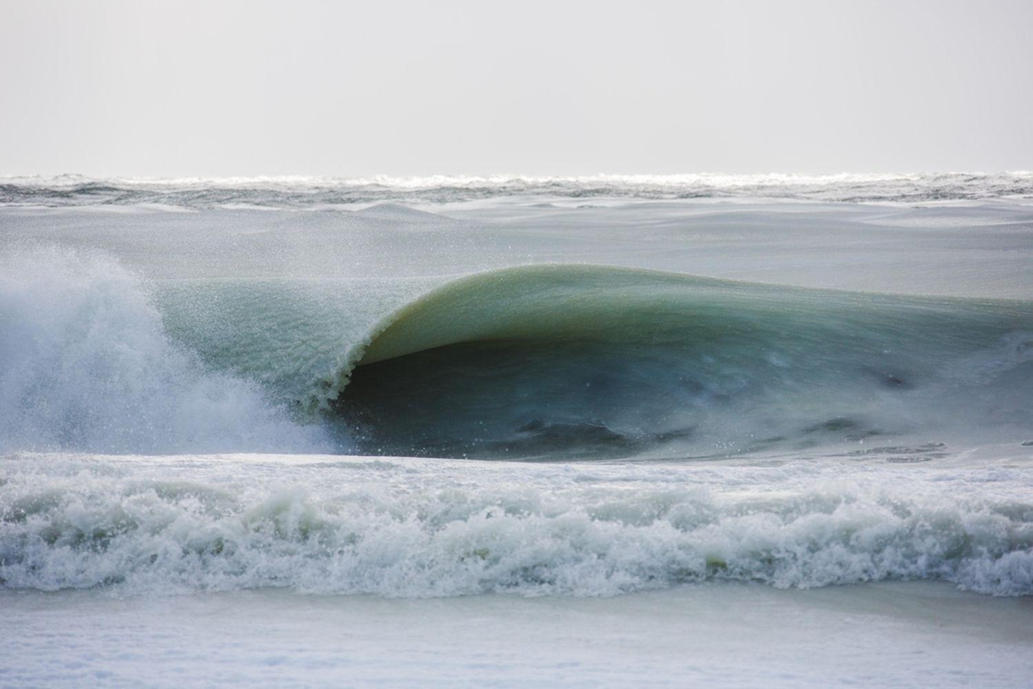 Beach Break Bliss
Limited edition of 19
30 x 45 in.
Pigment print face mounted to plexi
Acquired from artists studio 

Nantucket island photography by Jonathan Nimerfroh. Photograph of slurpee waves on the beach. 

Jonathan Nimerfroh is a surf and