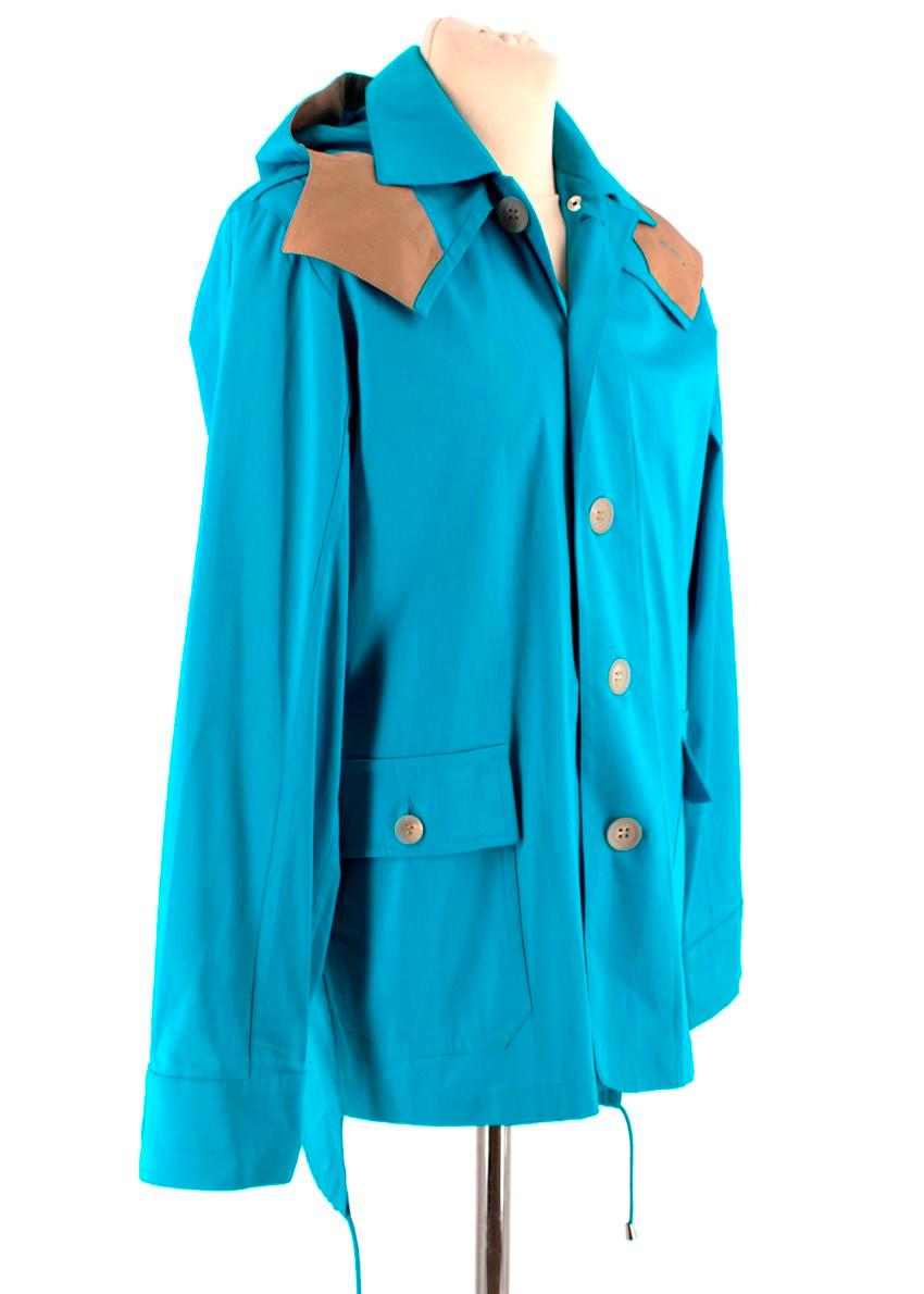 Jonathan Saunders Blue Hooded Jacket 

- Detachable popper fastened hood 
- Front button fastening
- Button fastened cuffs
- Front button fastened patch pockets 
- Drawstring bottom hem

Materials:
- 97% Cotton
- 3% Elastane

Dry clean only  

Made