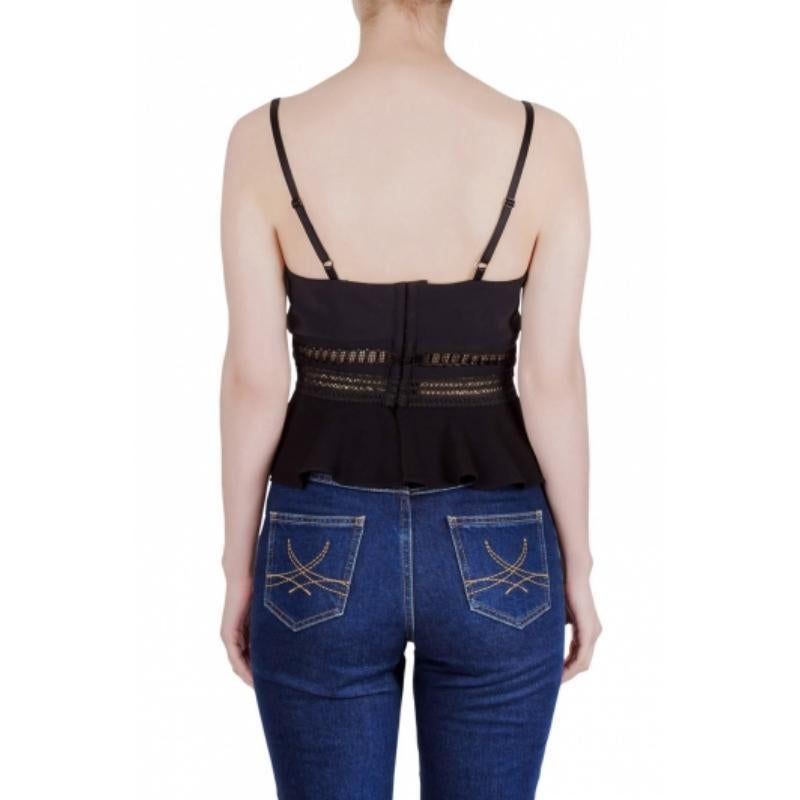 Jonathan Simkhai Crepé negro y encaje Bonded Peplum Cropped Top M en Excelente estado para la venta en Dubai, Al Qouz 2