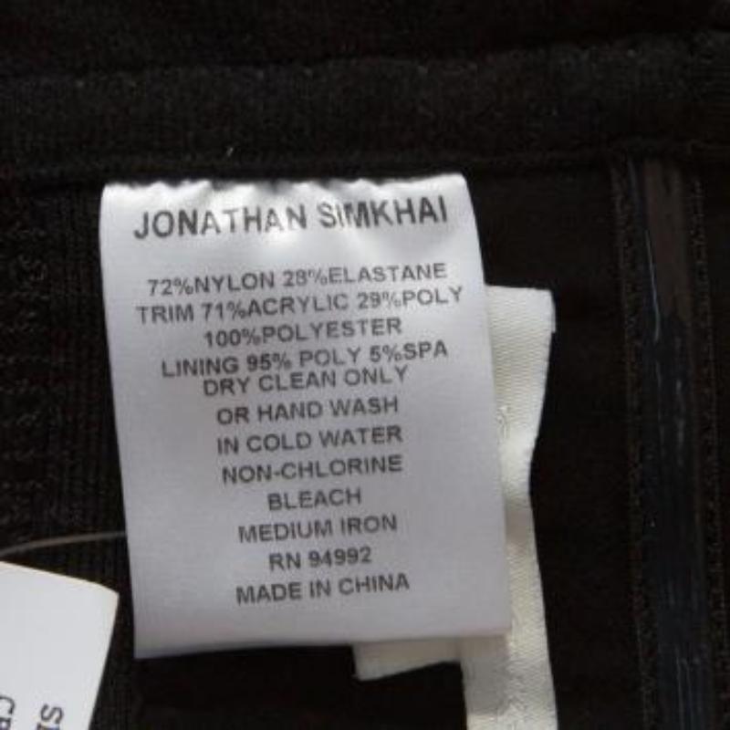 Jonathan Simkhai Crepé negro y encaje Bonded Peplum Cropped Top M en venta 1