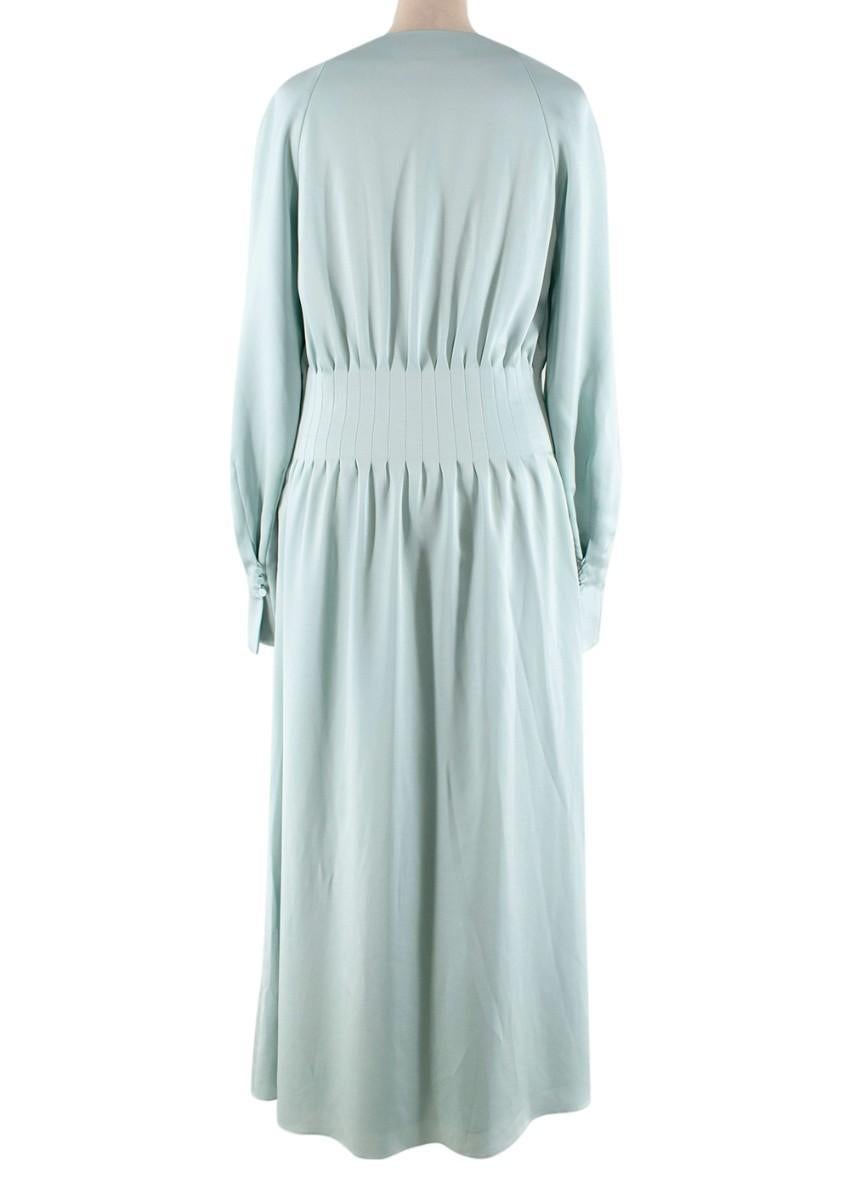 Jonathan Simkhai Seraphina Mint Hammered Satin Midi Dress

- Hammered satin midi dress in mint
- 40's-esque necklne with inset raglan sleeve
- Pleated detail on waist and cuffs
- Covered buttons font fastening
- Fully lined

Materials:
89%