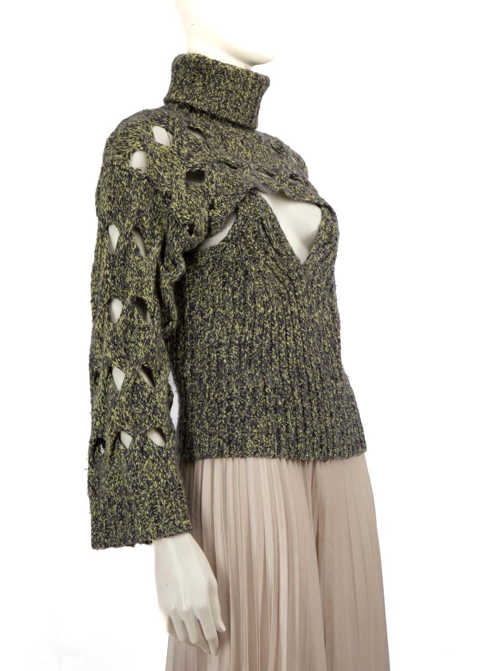 L'ÉTAT est très bon. L'usure minimale du pull deux pièces est évidente, il y a une légère décoloration sur le Label de la marque sur la camisole de cet article de revente Jonathan Simkhai designer utilisé.
  
  Détails
  
  
  Multicolore 
  
 