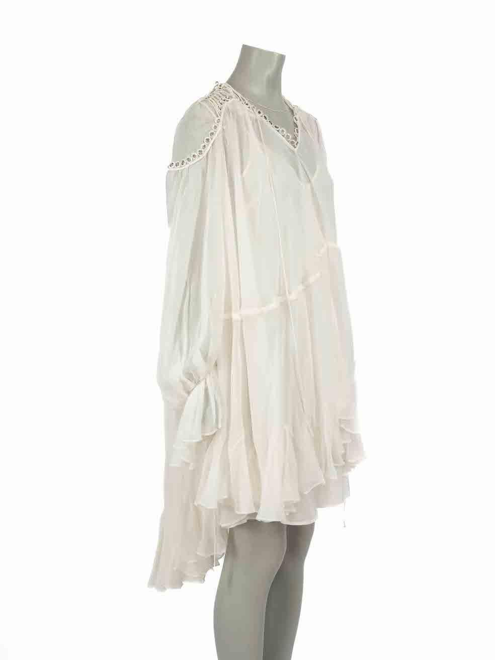 CONDITION is Very good. Hardly any visible wear to dress is evident on this used Jonathan Simkhai designer resale item.
 
Details
White
Silk
Dress
Sheer
Neck tie
Eyelet lace up detail
Draped
Long sleeves
Slip underdress included
 
Made in China
