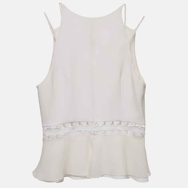 Este top de diseño te aportará estilo y comodidad. Confeccionado con el mejor tejido  la creación se ha detallado enormemente. Combínalo con una falda y tacones.