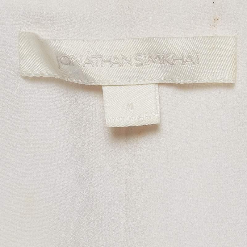 Jonathan Simkhai Top de volantes de crepé con cordones blanco S en Bueno estado para la venta en Dubai, Al Qouz 2
