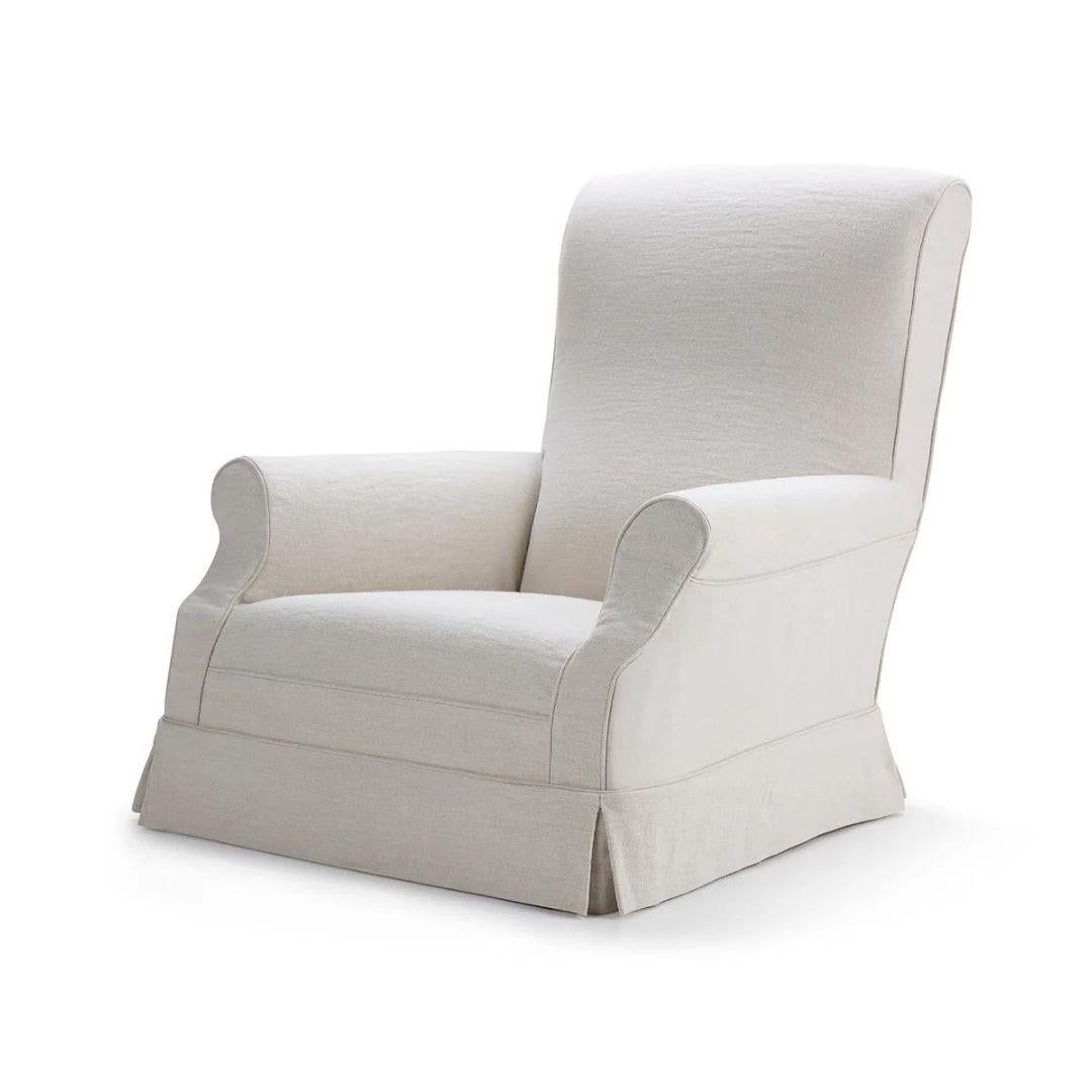 Jones is a classic armchair influenced by the traditional English designs of the 18th century. 

Its low seat and gently sloping back contribute to its remarkable comfort. 

The Jones Armchair is customizable, made to order, and we offer a variety