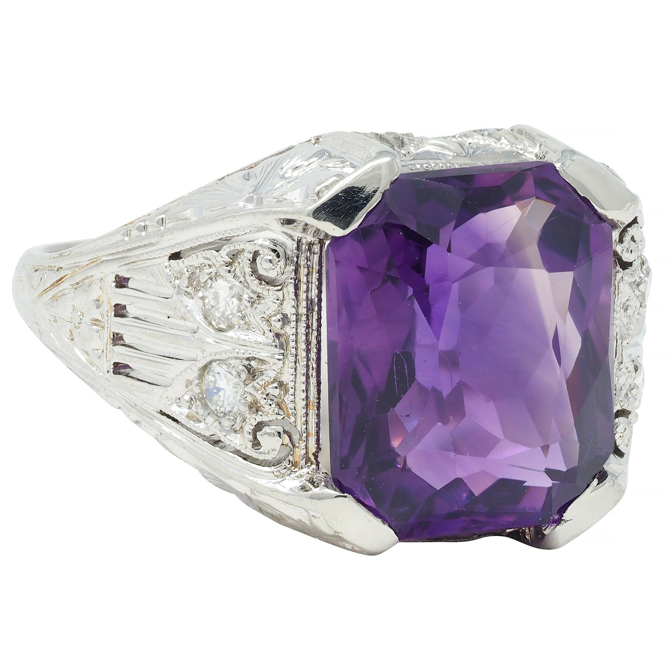 Centering an octagonal-shaped mixed-cut amethyst measuring 9.5 x 11.5 mm 
Transparent medium to light pinkish-purple to purple in color
Set with wide prongs and flanked by old single cut diamonds
Weighing approximately 0.12 carat total - eye clean