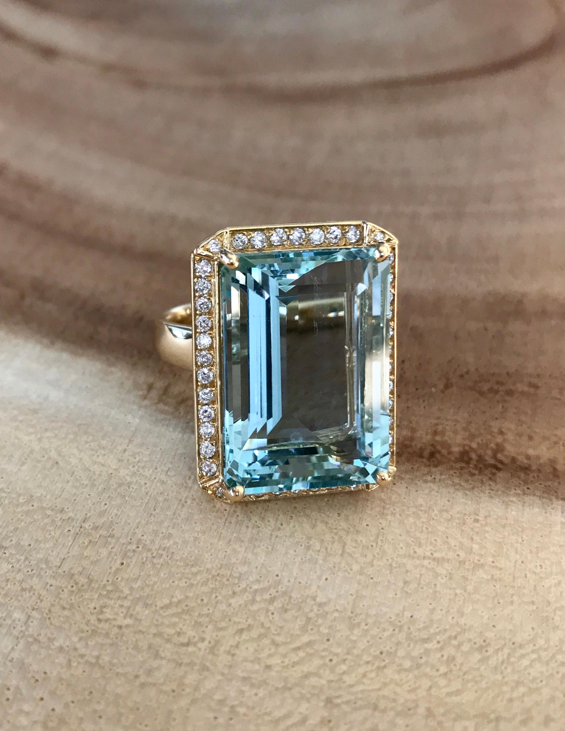 emerald cut aquamarine ring yellow gold