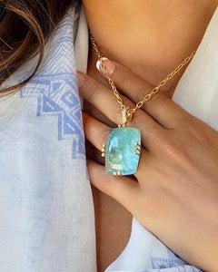 Collier pendentif en or jaune 18 carats avec cabochon d'aigue-marine et diamants