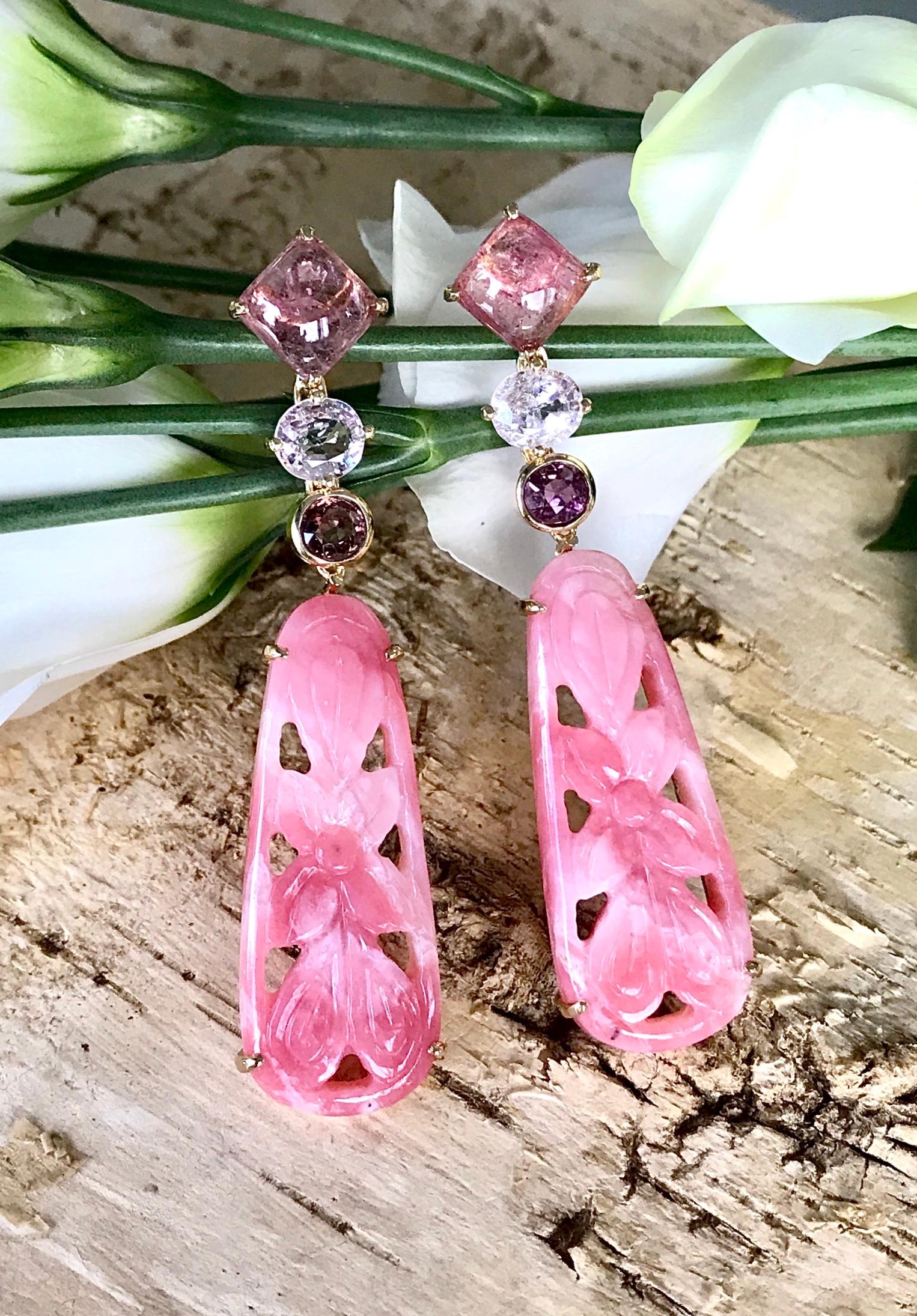 One-of-a-kind carved pink opal, sapphire and tourmaline drop dangle earrings, handcrafted in 18 karat yellow gold. 2.44 inches or 62 mm length.

These uniquely carved pink opals are combined with sparkling sapphires and tourmalines to create an