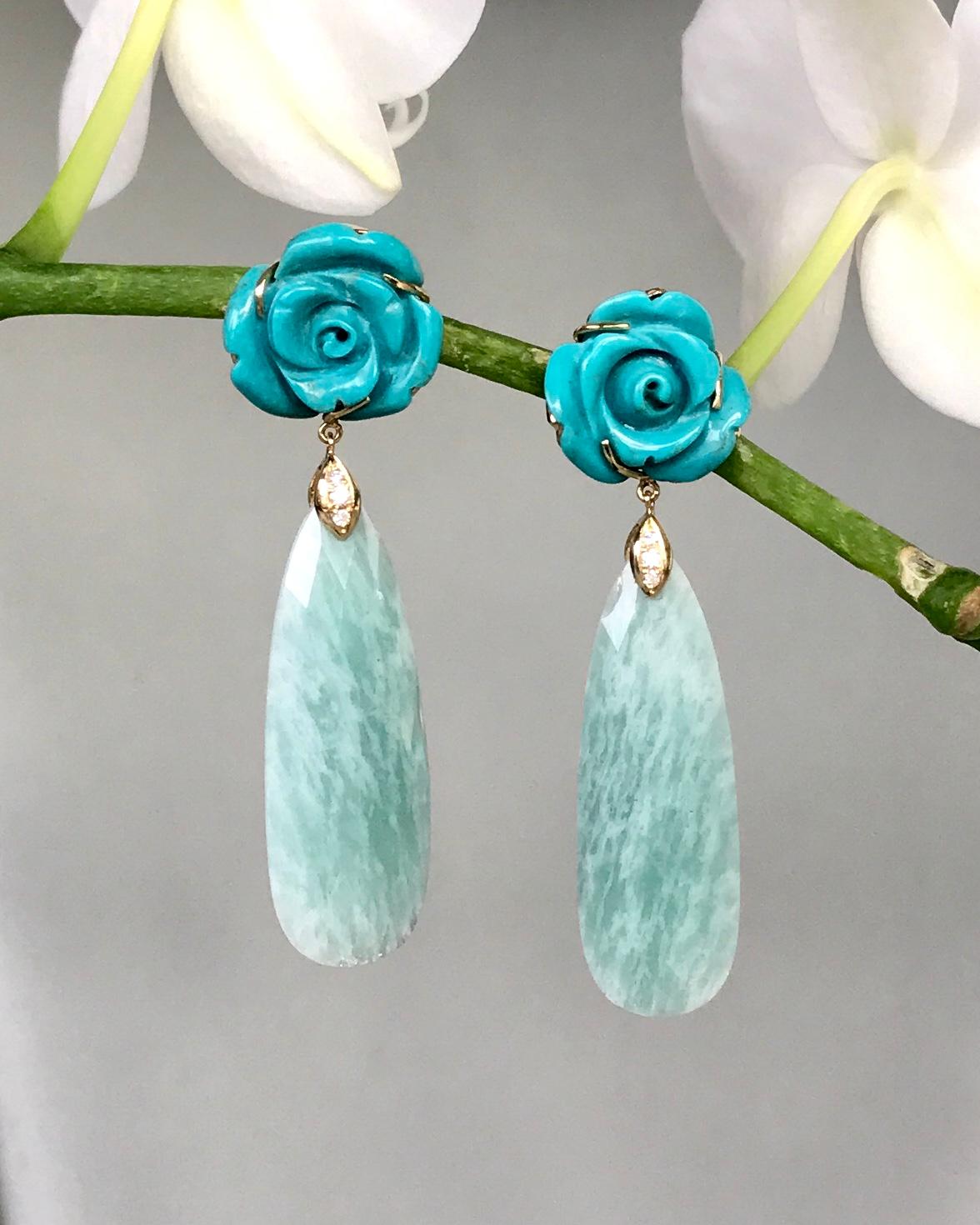 These Joon Han carved turquoise flowers, amazonite, and diamond drop dangle earrings bring a refreshing pop of bright colors into your spring wardrobe. Handcrafted in 18K yellow gold. 

Joon Han is a contemporary collection of luxurious, elegant and