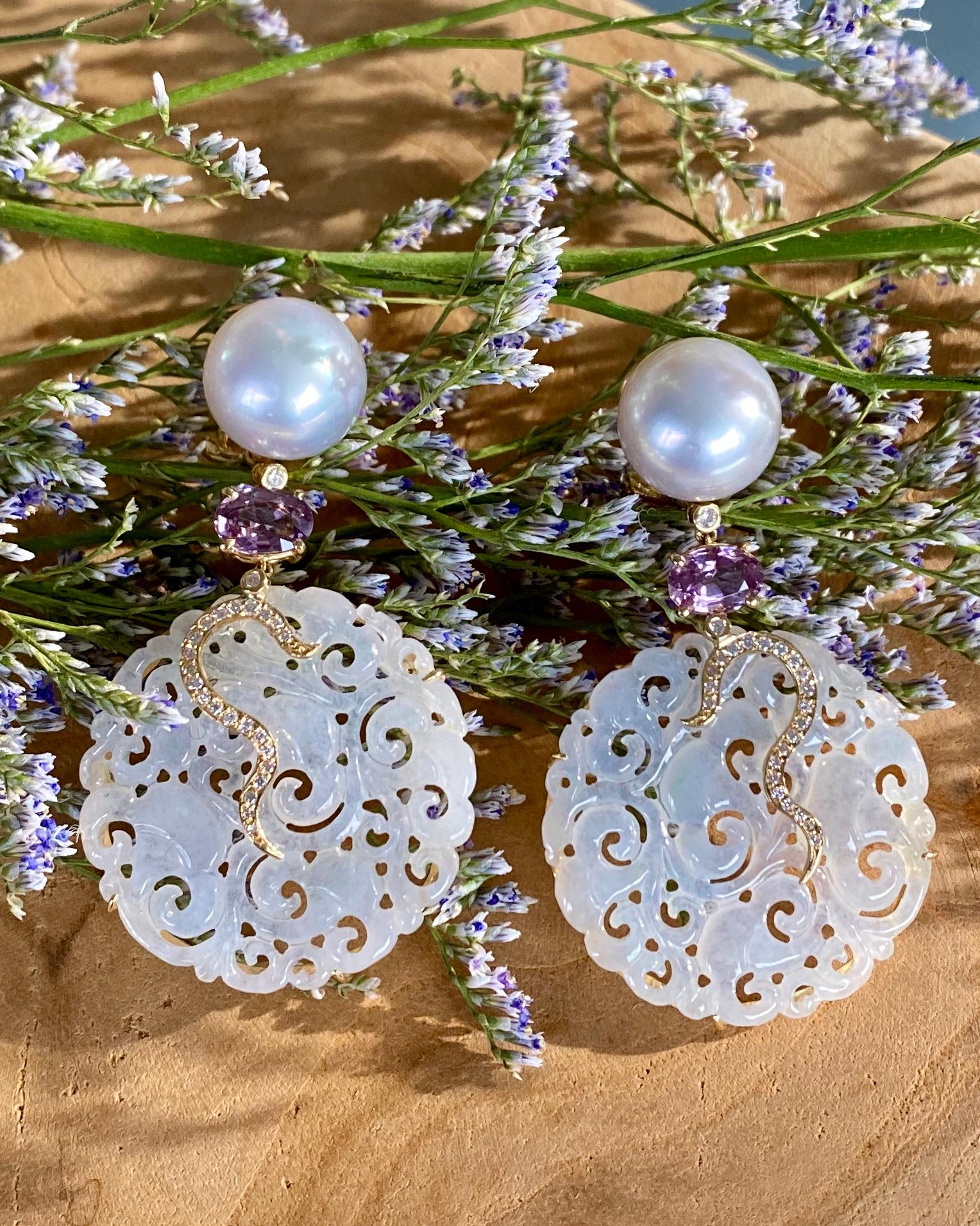 Earrings of carved white jade, white South Sea pearls, spinels and diamonds, handcrafted in 18 karat yellow gold.

A signature Joon Han piece, these beautiful one-of-a-kind carved white jade earrings with diamond details are exquisite. These dangle
