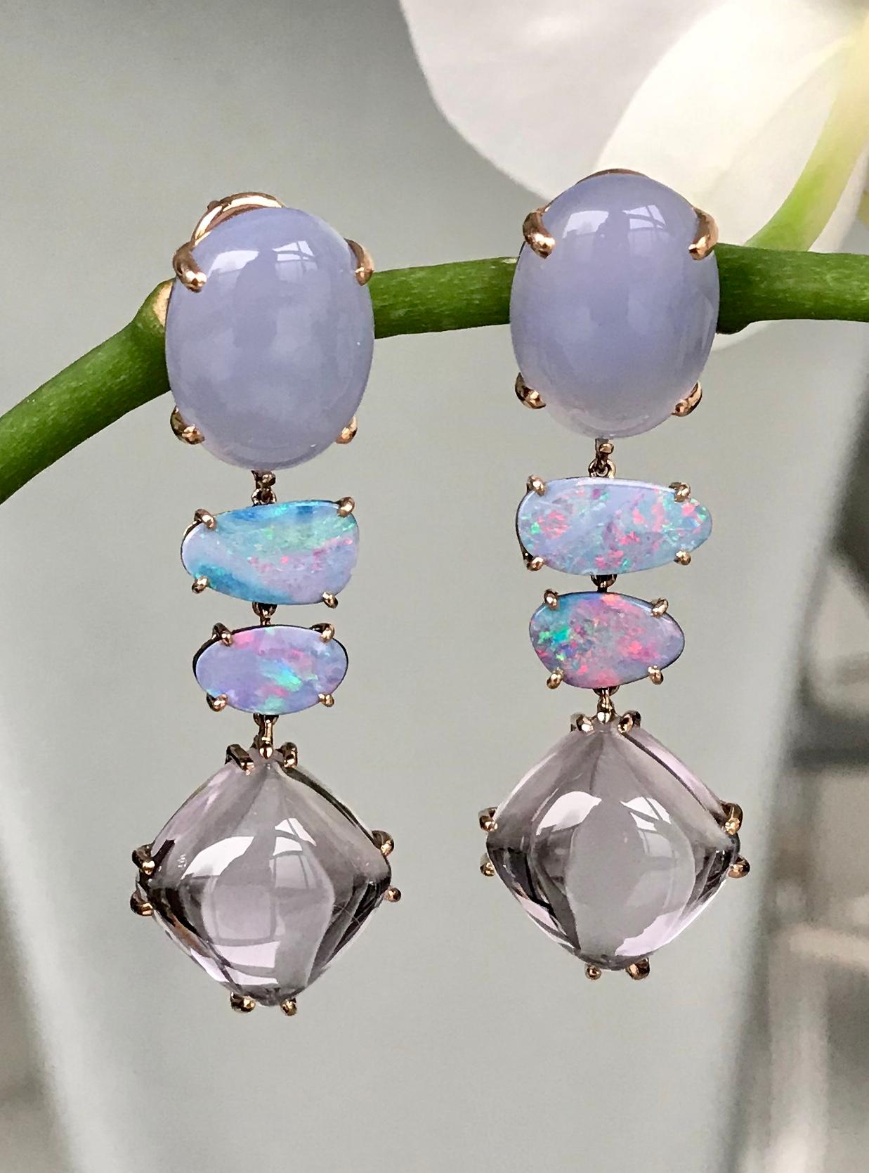 One-of-a-kind earrings of chalcedony, boulder opals, and Rose de France amethysts, handcrafted in 18 karat rose gold.

These are beautiful dangle earrings of chalcedony cabochons, fiery boulder opals, and translucent rose-de-France amethysts. A