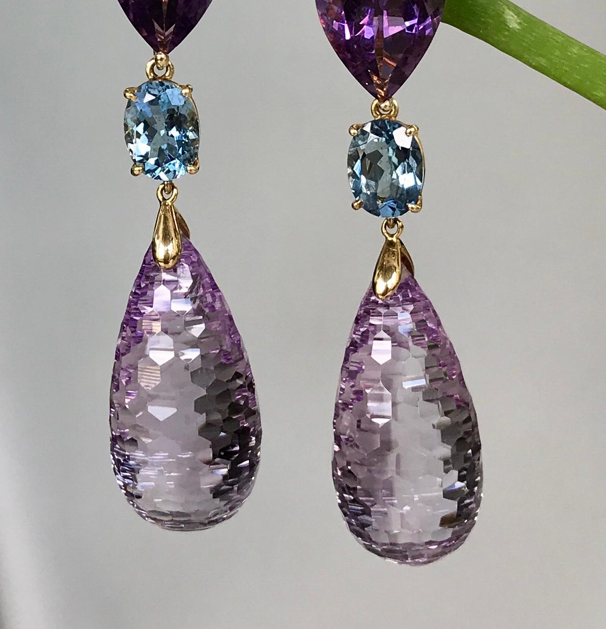 Joon Han one-of-a-kind simply elegant earrings of faceted amethysts, top quality aquamarines, and beautiful fancy-cut amethyst briolettes. The exquisite briolettes glitter and shimmer as they reflect the light. These timeless earrings are
