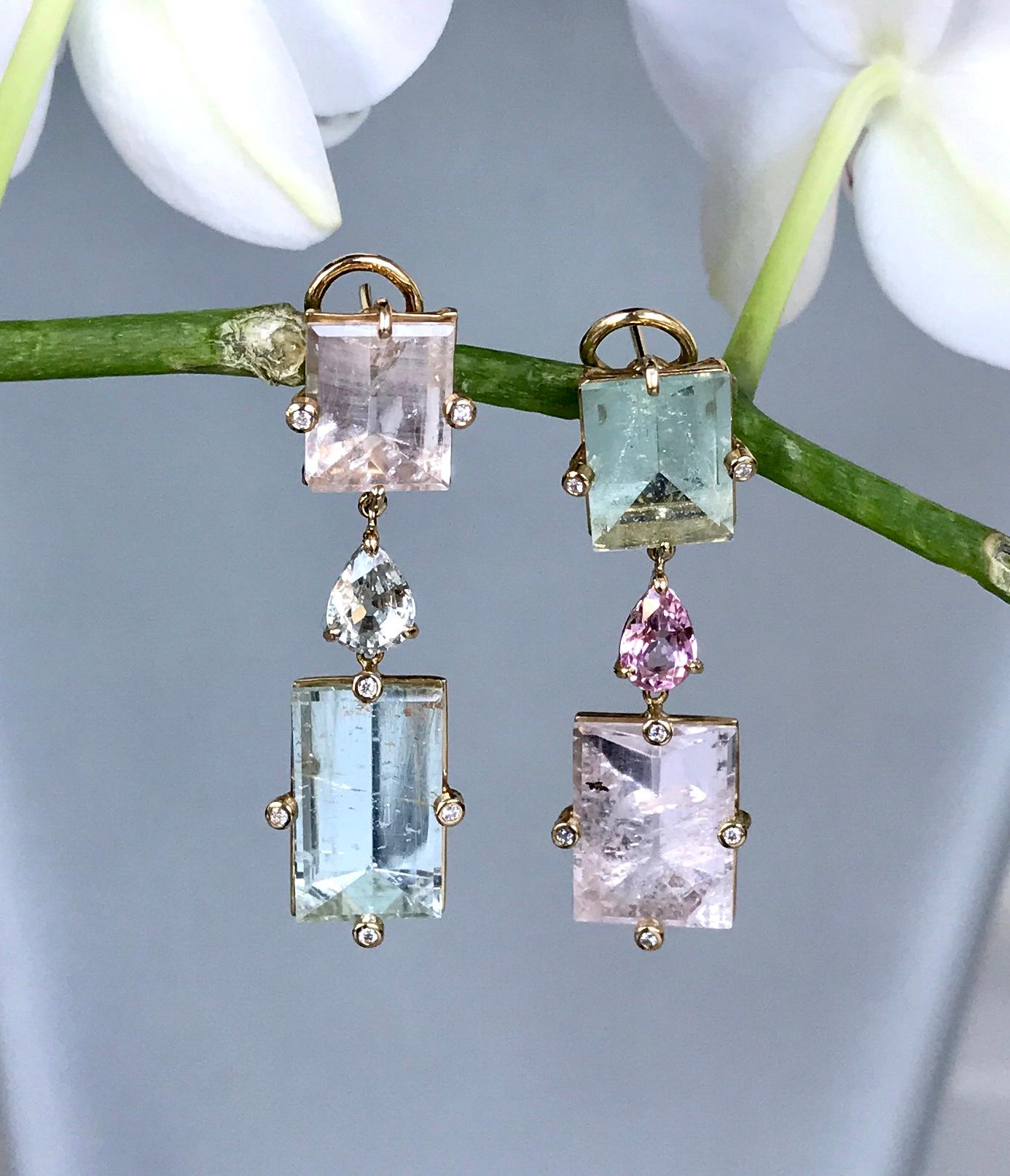 These Joon Han one-of-a-kind drop dangle earrings of mirror-cut beryls and morganites, fancy faceted sapphires, and diamonds are uniquely mismatched. Handcrafted in 18K yellow gold, the subtle pastel shades of light greens and pinks make these