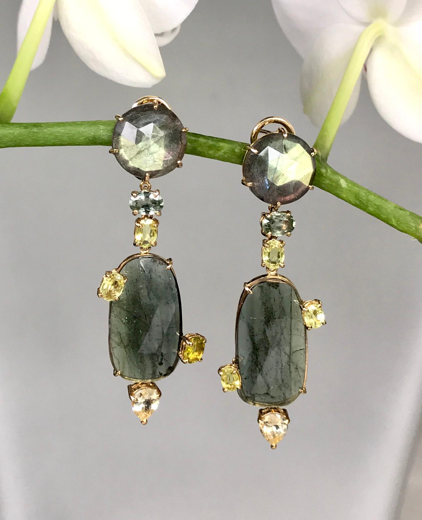Labradorites, green tourmaline slices, sapphires and chrysoberyl dangle earrings, handcrafted in 18 karat yellow gold.

These one-of-a-kind earrings are whimsical, fun and interesting, created with multi gemstones of labradorites, fancy rose cut