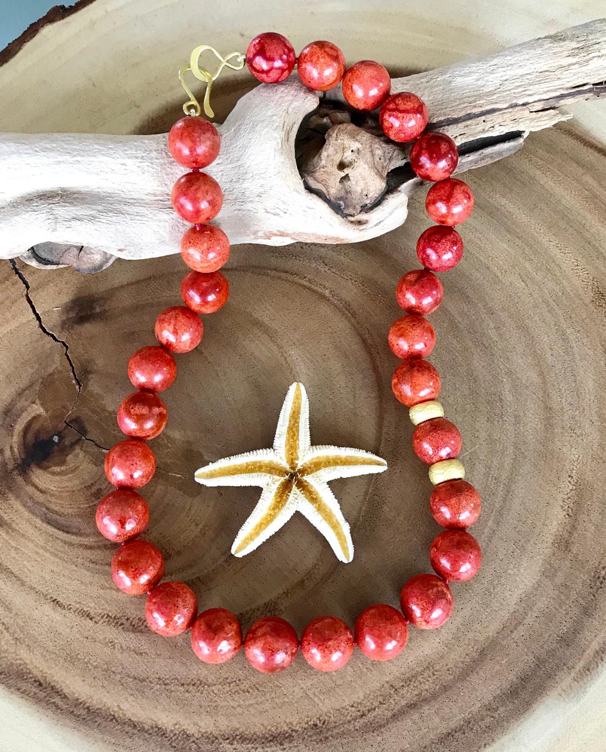 This bold and elegant Joon Han orange coral bead necklace makes a colorful statement. Simple yet luxurious, these vibrant, big orange beads are the perfect color to accent any outfit.

Joon Han is a contemporary collection of luxurious, elegant and