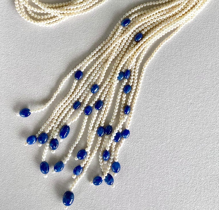 Contemporary Round White Seed Pearls and Blue Sapphire Beads Seven Strand Necklace For Sale
