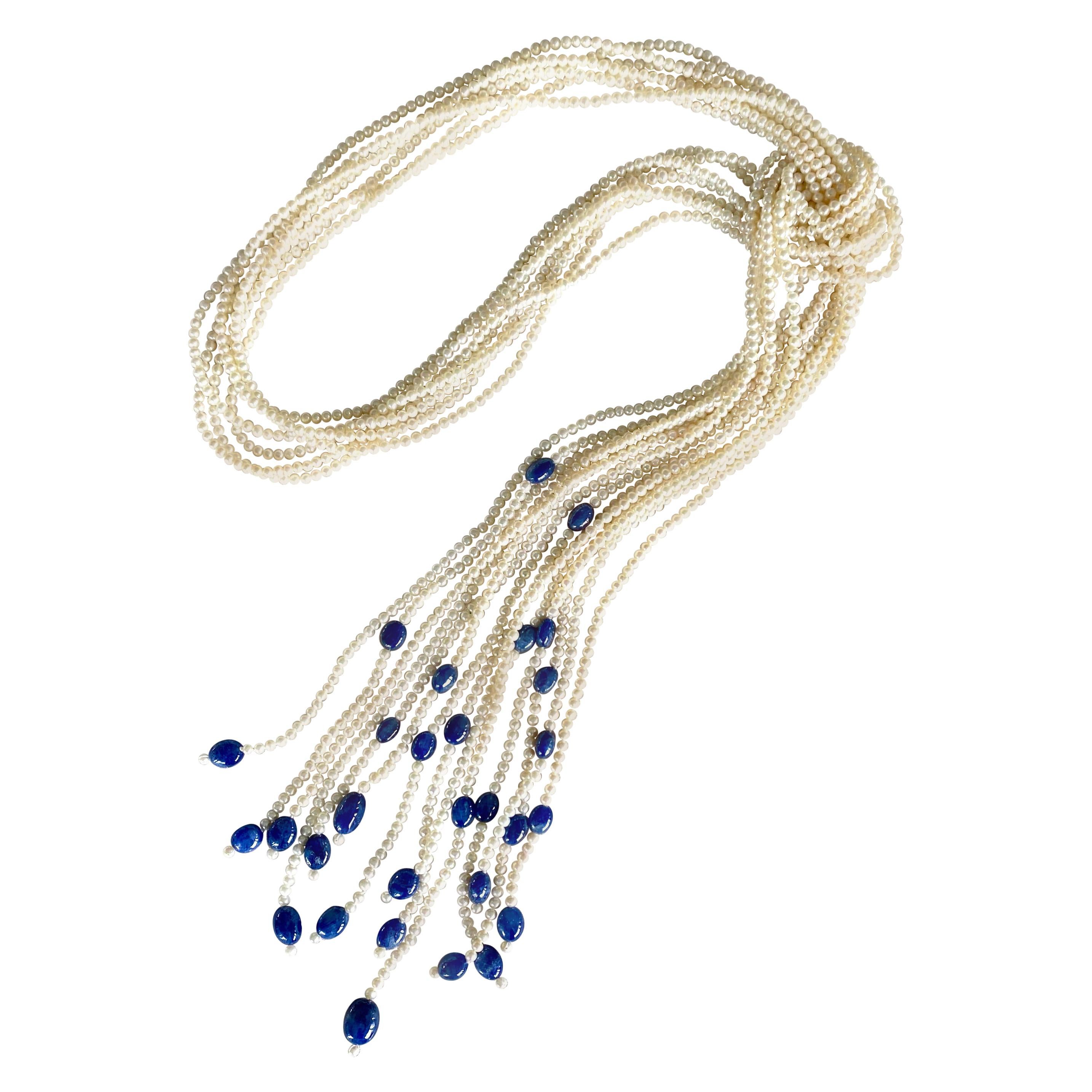 Siebenstrangige Halskette mit runden weißen Saatperlen und blauen Saphirperlen und Perlen