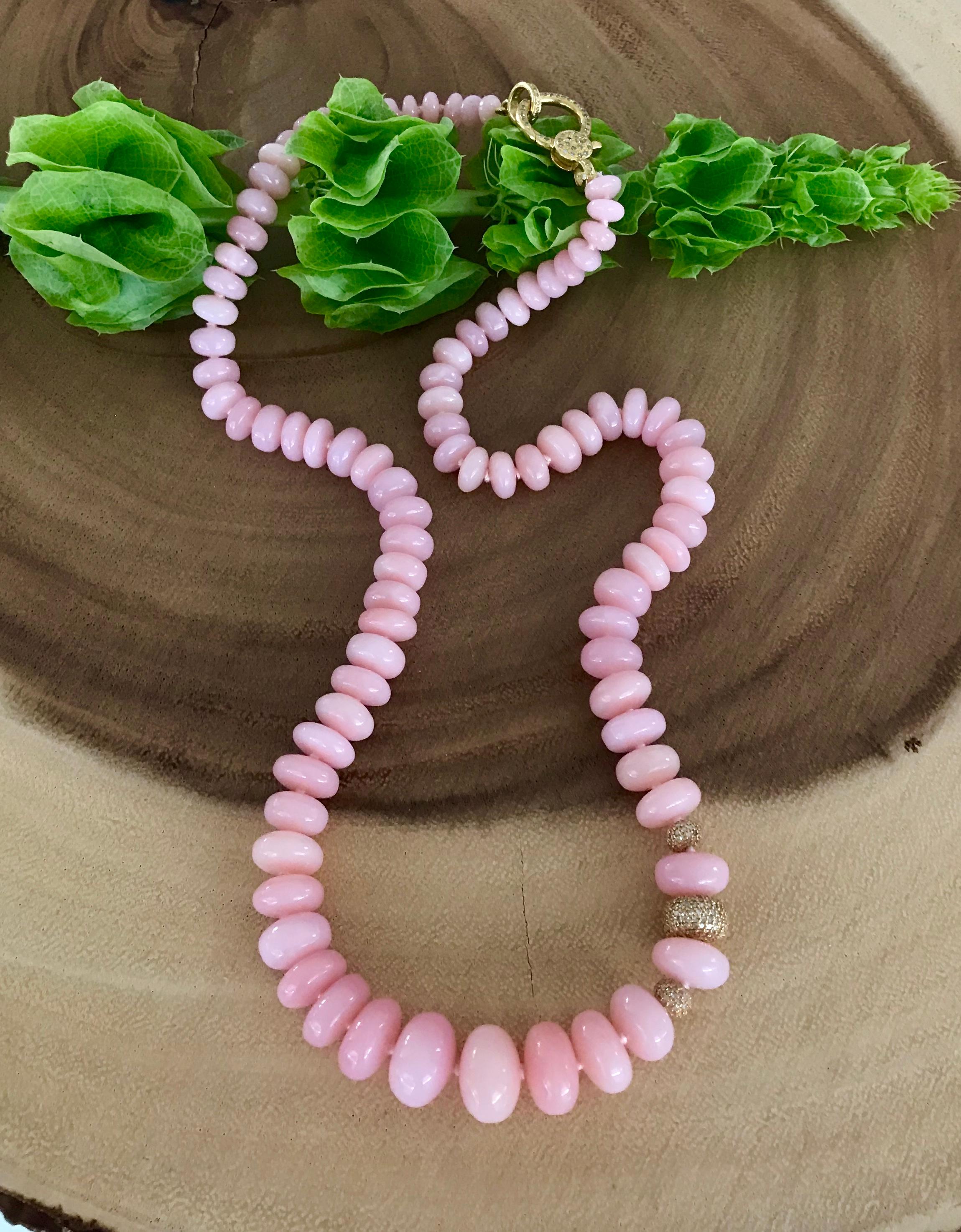 This stunning one-of-a-kind Joon Han pink opal bead necklace with diamond doughnut enhancers and a diamond clasp brings a touch of beauty and sophisticated refinement to all styles. Handcrafted in 14K yellow gold, this gorgeous bead necklace is the