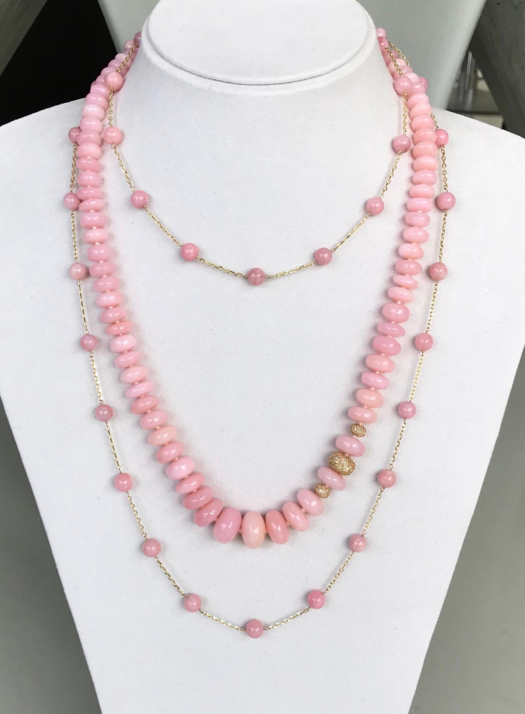 This Joon Han one-of-a-kind pink opal beads station chain necklace is delicately elegant and is a perfect accent piece. Wear it alone or layered with a pretty cocktail dress, a crisp white shirt or a soft sweater. Handcrafted in 14K yellow