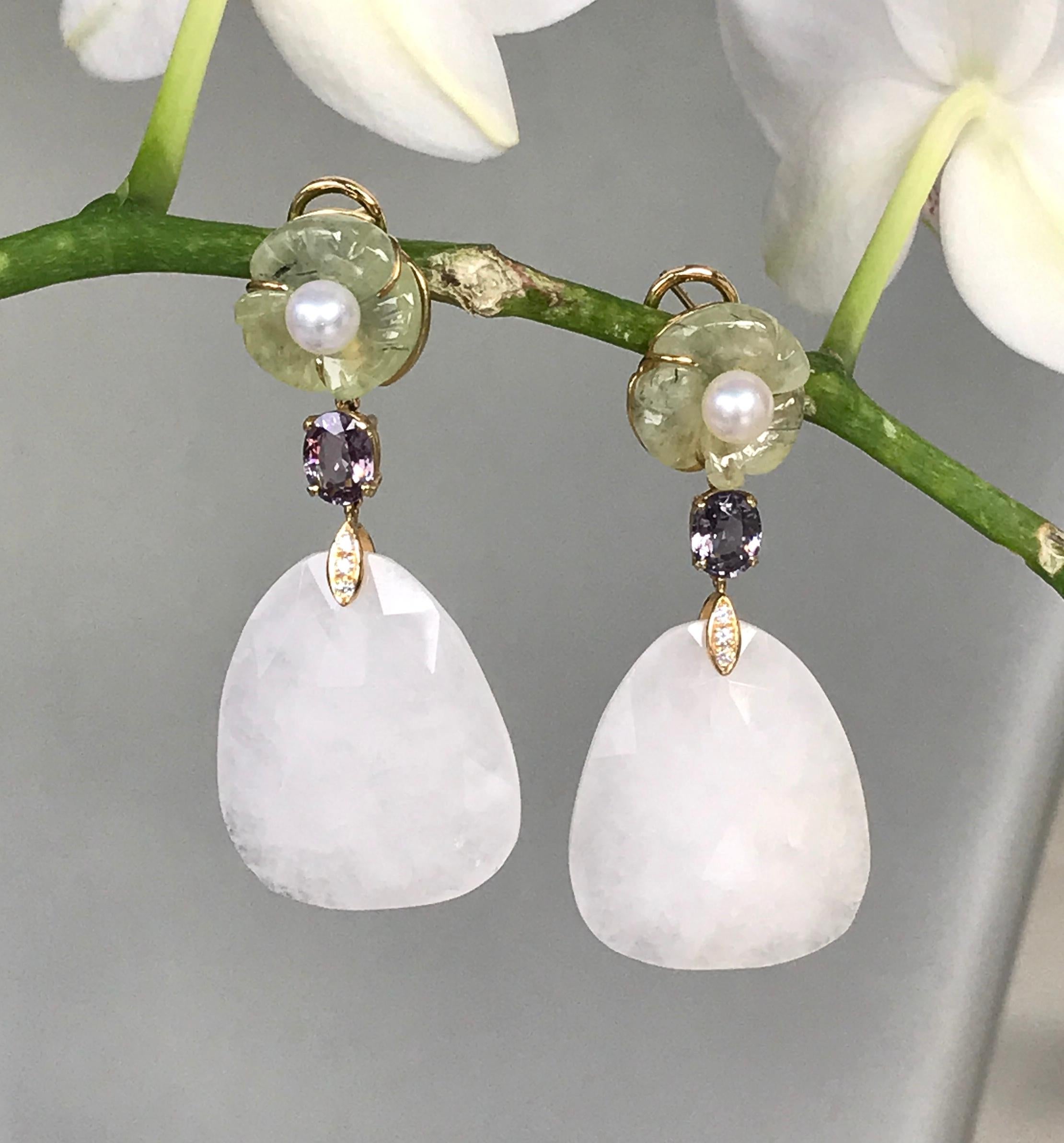 One-of-a-kind dangle earrings with carved prehnite flowers and an Akoya pearl center, with faceted spinels, diamonds, and rose-cut white agate drops, handcrafted in 18 karat yellow gold. 2.25 inches or 57 mm length.

Be in full bloom with these