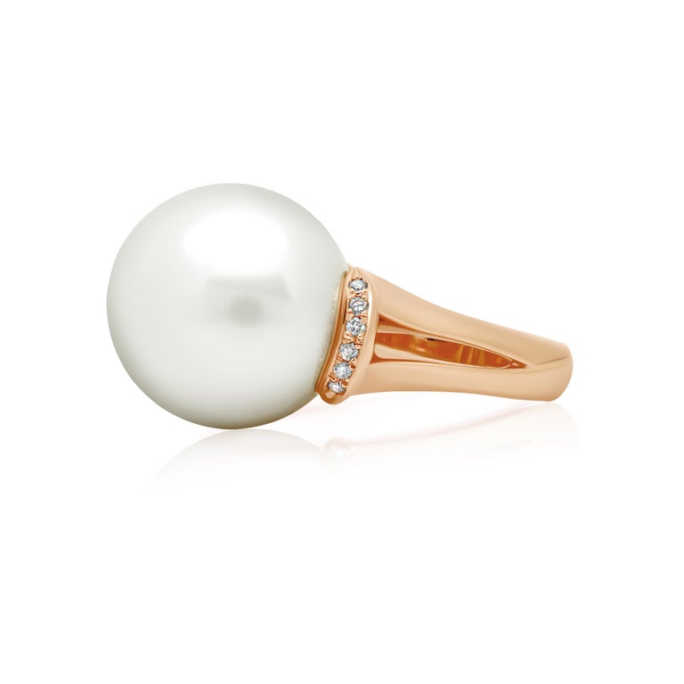 A one-of-a-kind large white South Sea pearl and white diamond solitaire cocktail ring, handcrafted in 18 karat rose gold.

This exquisite pearl ring is very elegant yet modern. The beauty of the large lustrous South Sea pearl is the focus of this