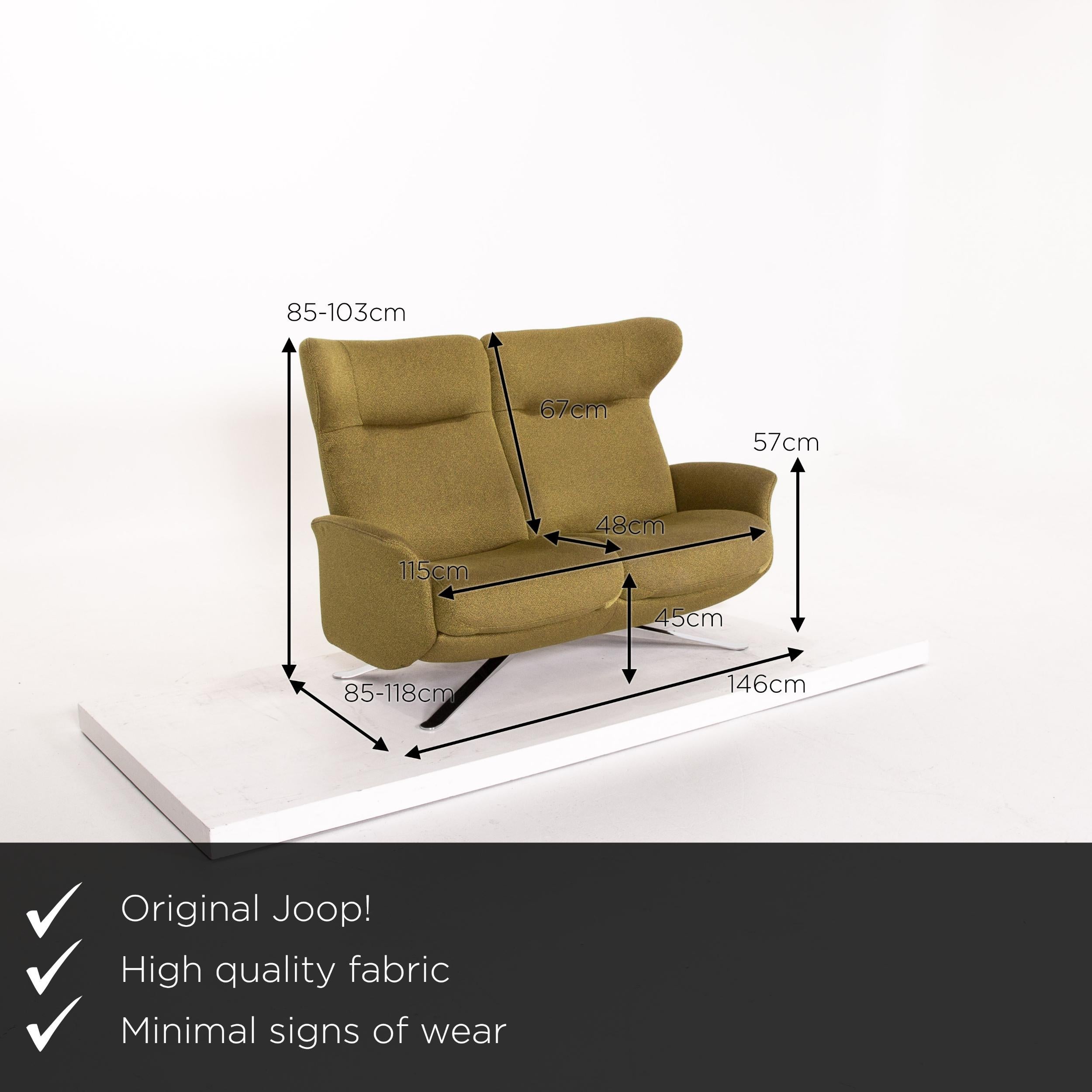 We present to you a Joop! Fabric sofa green olive green two-seat relax function couch.
 

 Product measurements in centimeters:
 

Depth 85
Width 146
Height 85
Seat height 45
Rest height 57
Seat depth 48
Seat width 115
Back height