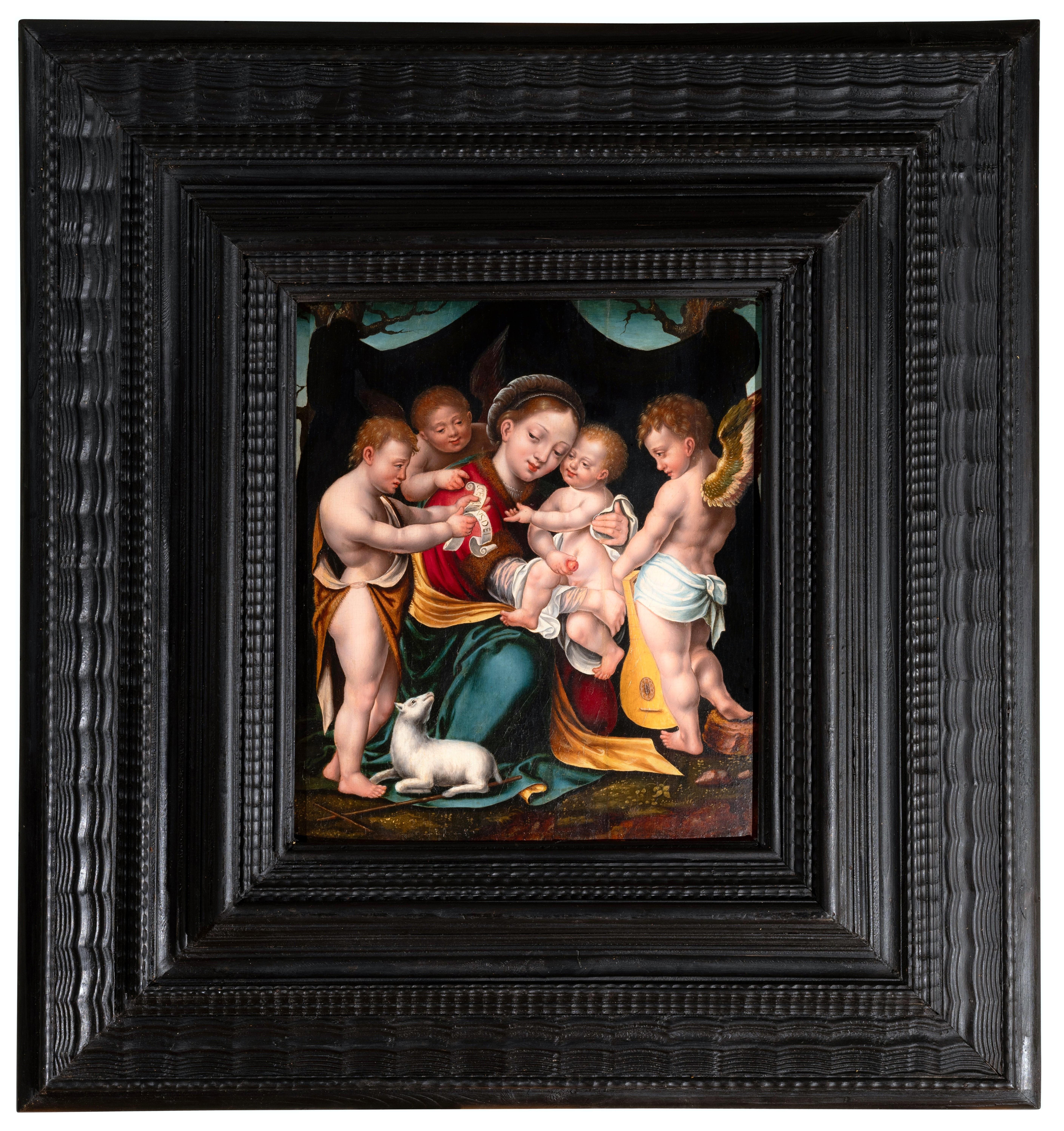 Madonna and child with angels, circle of Joos Van Cleve, 16th c. Antwerp school - Painting by Joos van Cleve