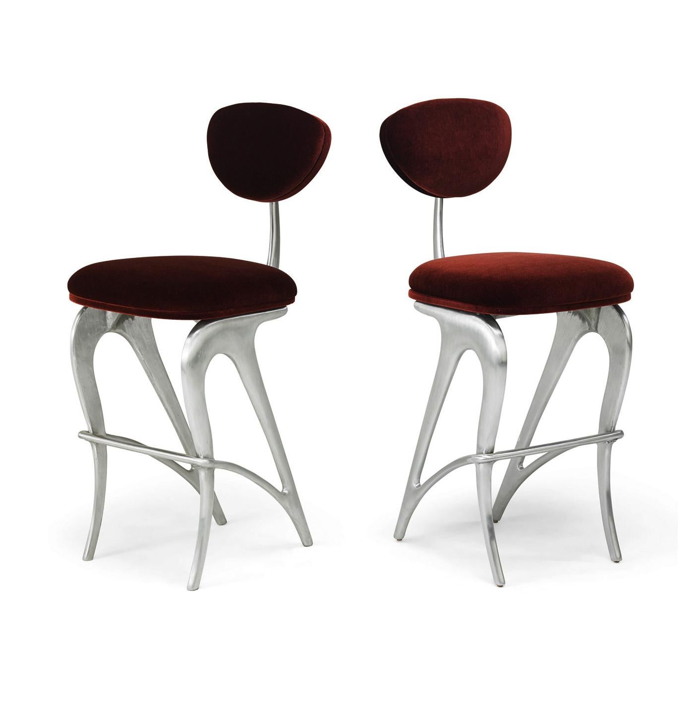 Jordan Mozer, (b.1958), Hudson Club S

Stools, Chicago, Il. 1998/2016. Cast and Polished Recycled Magnesium Aluminum Alloy, Wool Mohair Upholstery. Provenance: collection of the artist. Raised signature and model number. Measurements: 47.5” high x